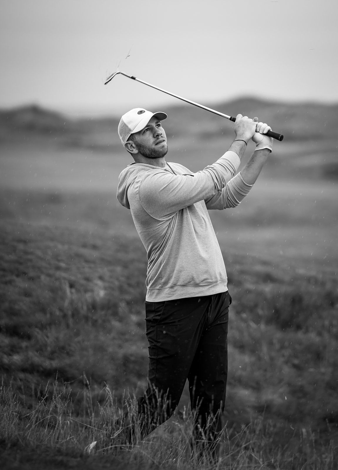 Golfer in action, played a perfect shot at Kingsbarns Links