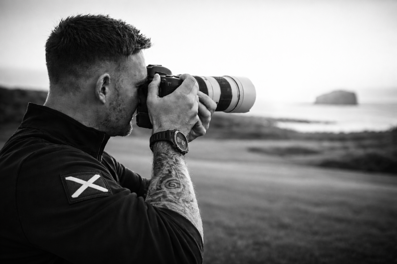 Ryan, founder Ryan Caven Golf, taking photos at golf course