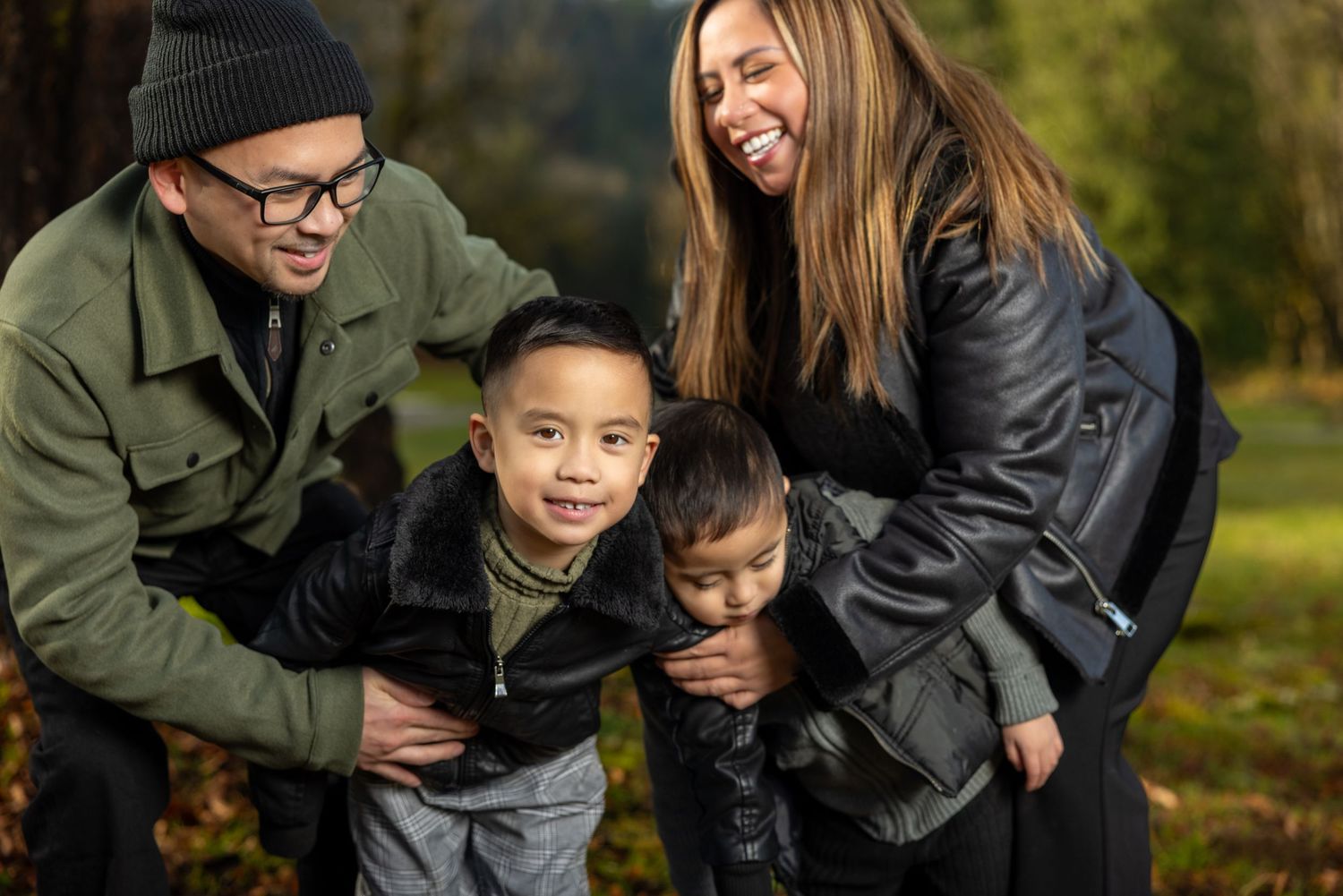 Family having fun together outdoors on a fall day.