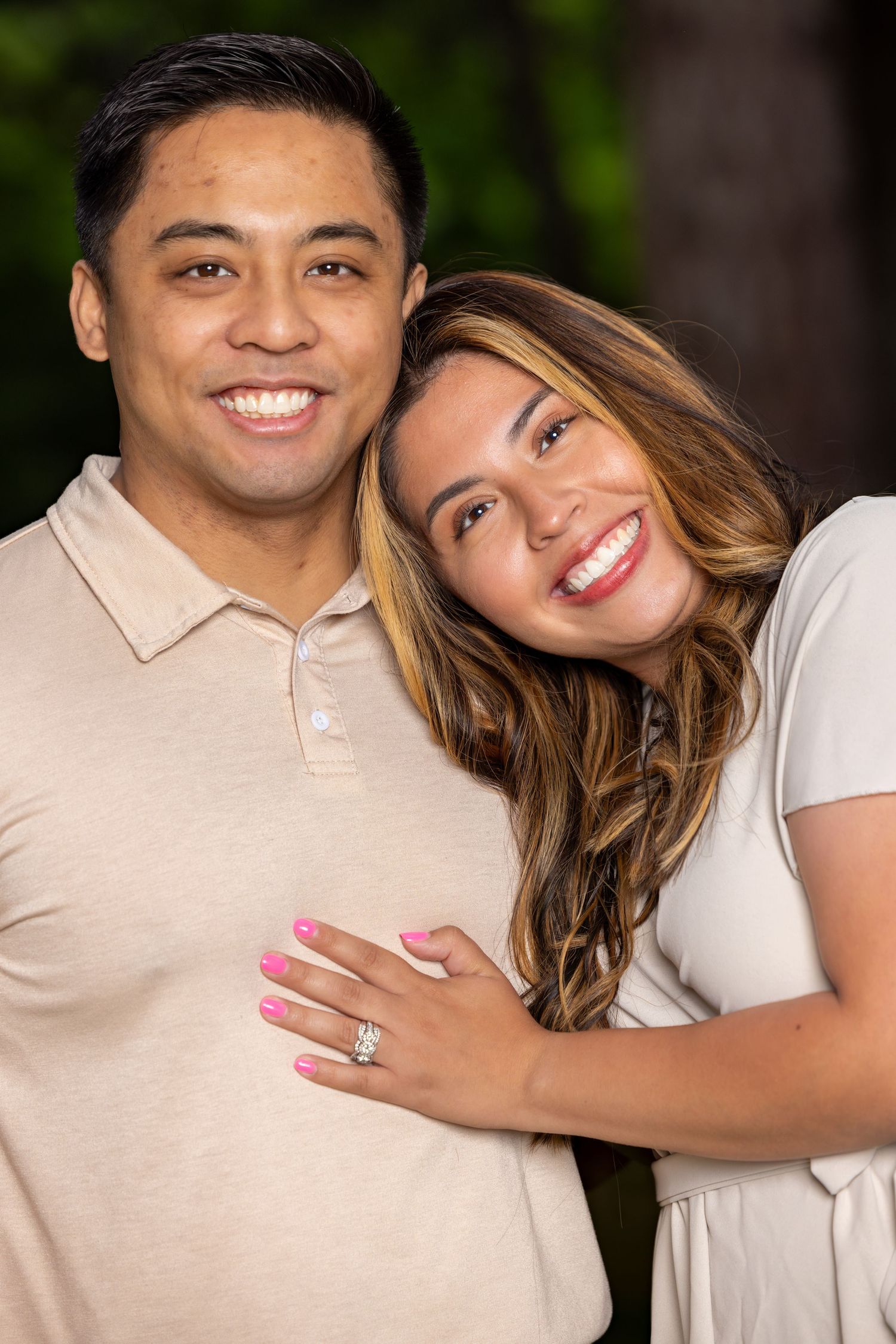 Intimate portrait sequence of couple in coordinated light colored outfits showing affection.