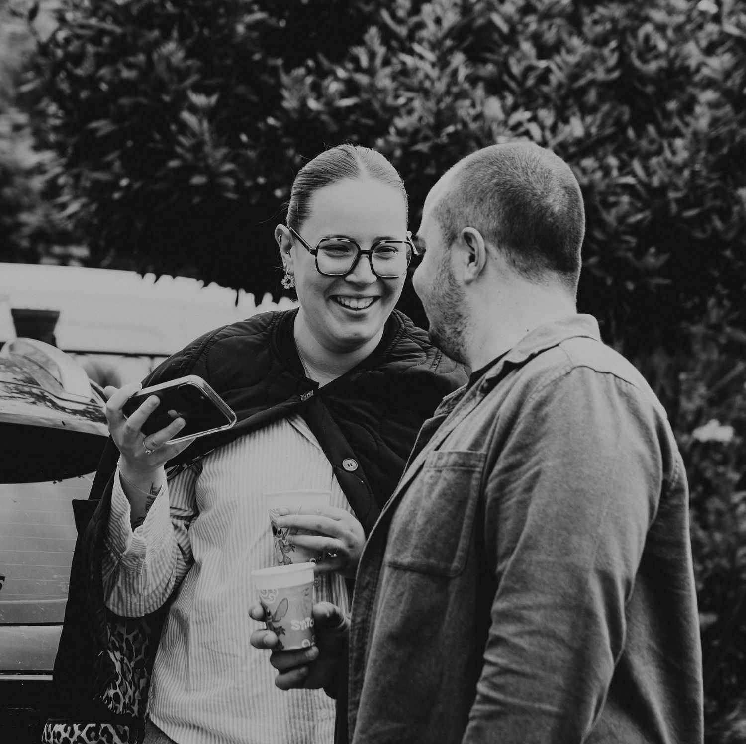 Five casual portrait-style photographs showing people in casual settings wearing glasses and smiles on their faces.