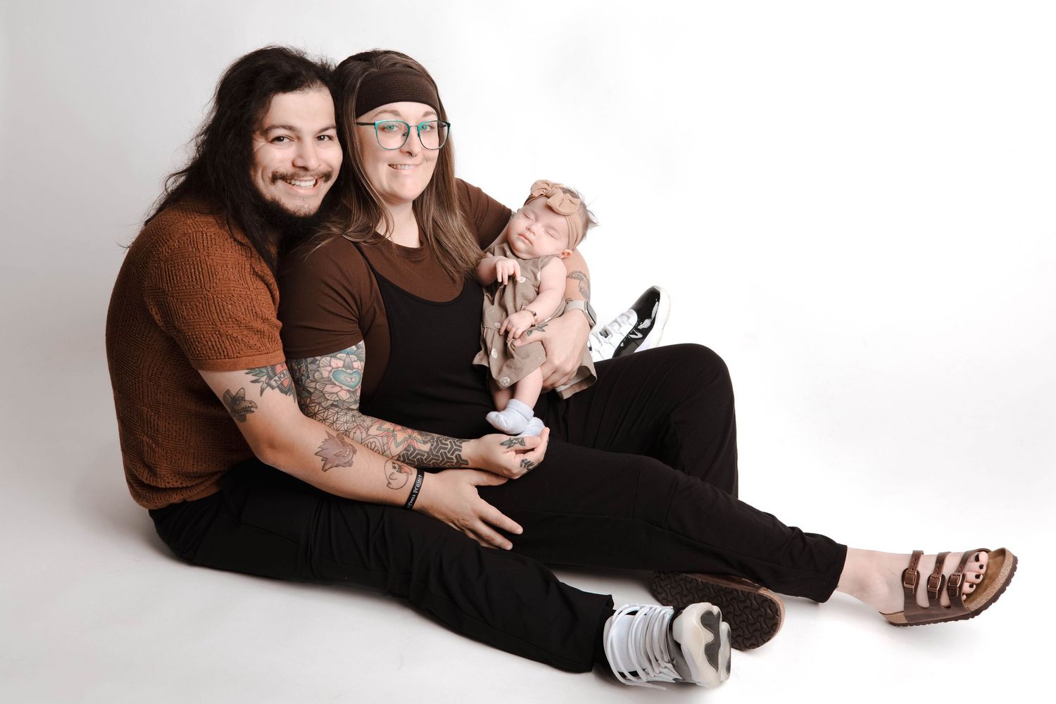 Family portrait series showing playful moments and connections on white studio background.