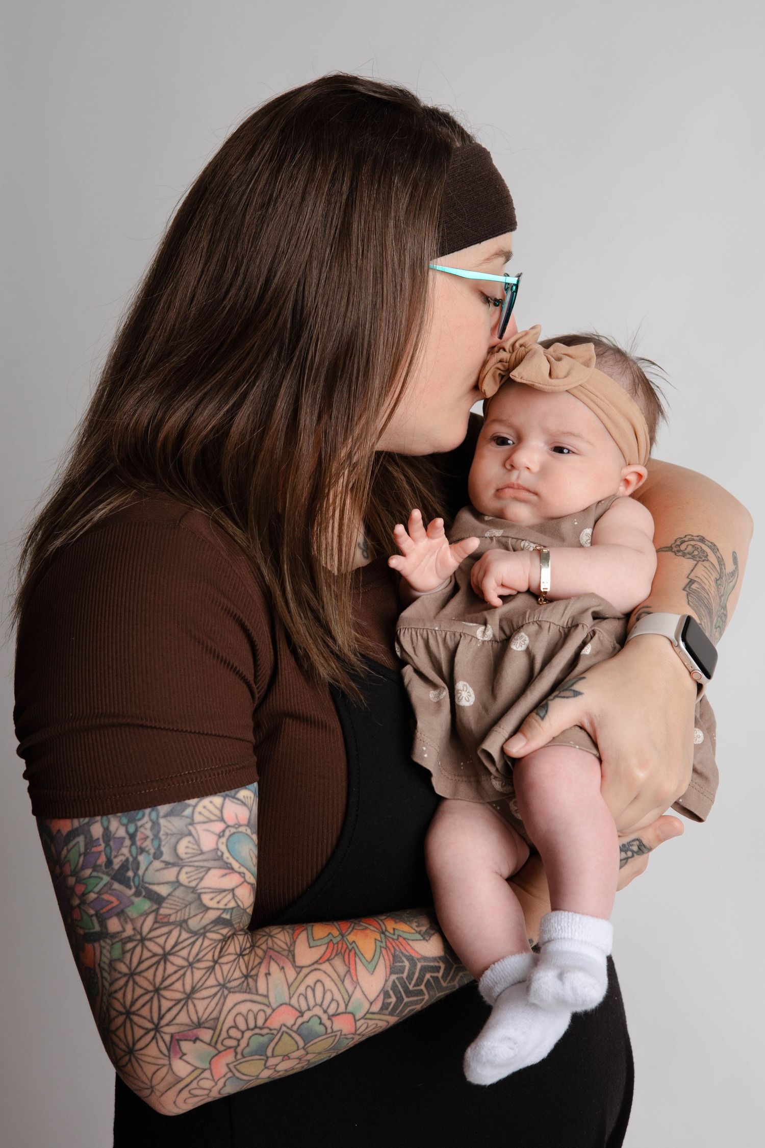 Tender parenting moments captured in series showing affectionate interaction with infant.