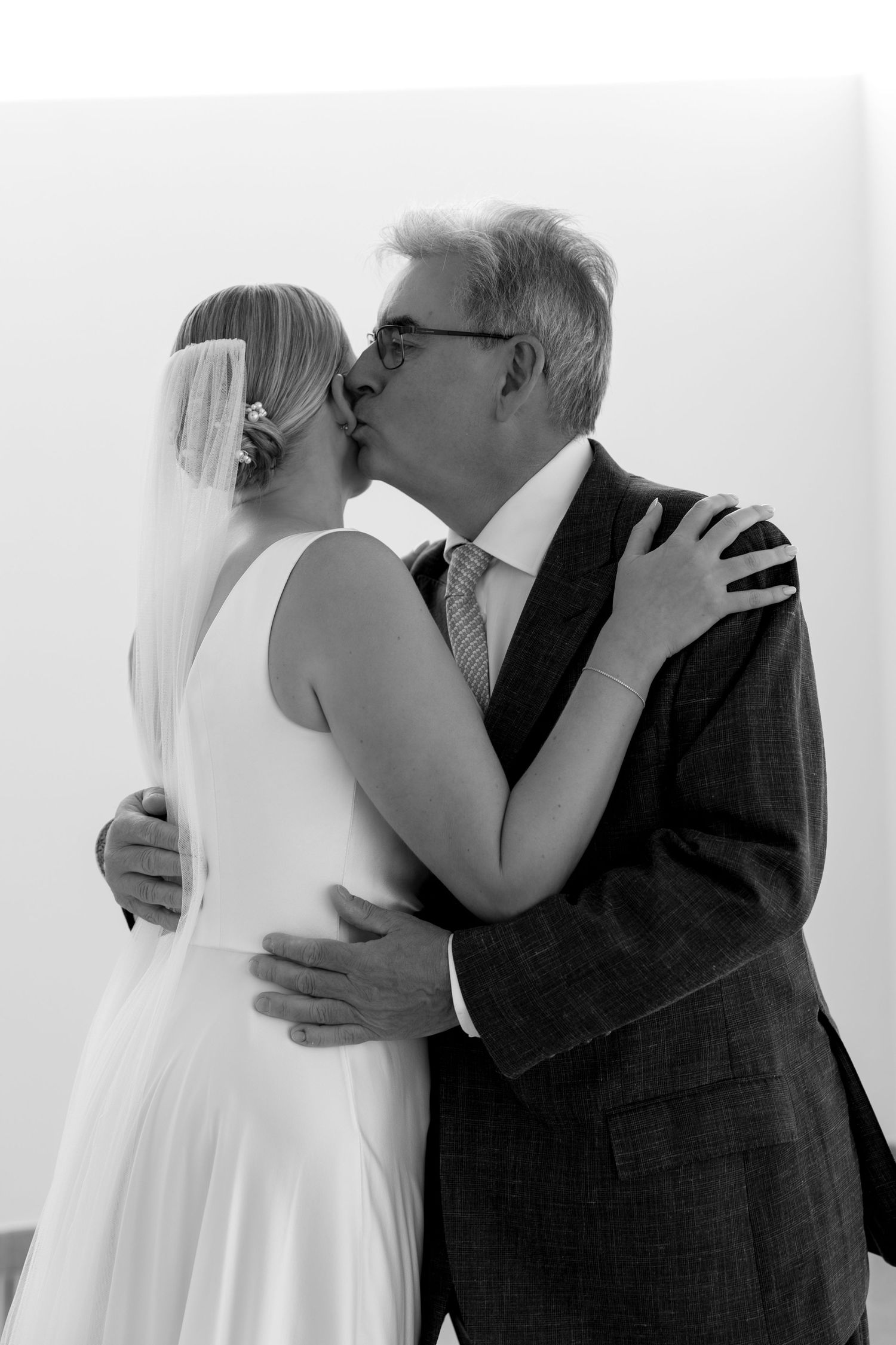 Emotional first look of bride with her dad before wedding ceremony