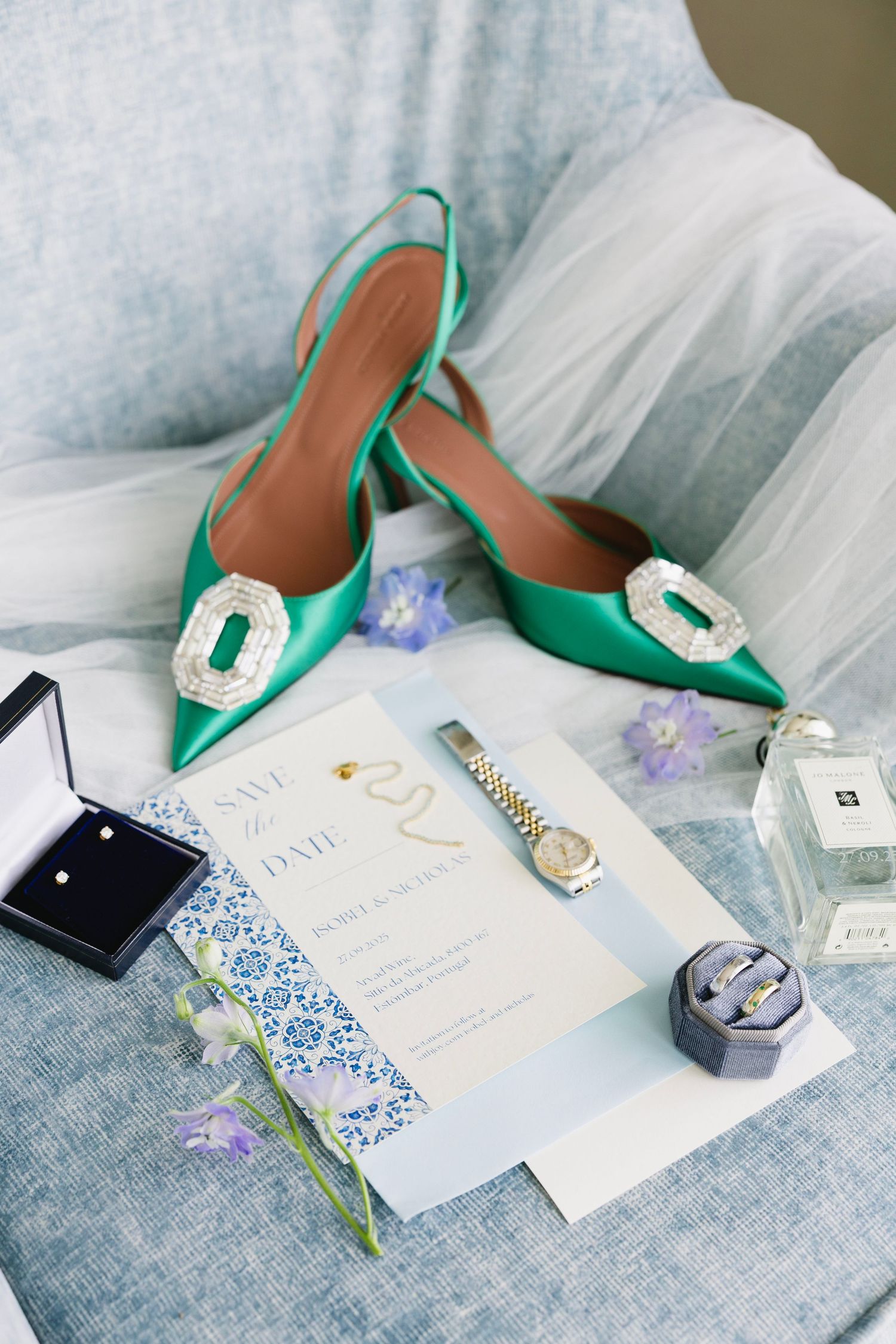 Wedding rings and bridal accessories arranged for detail shot