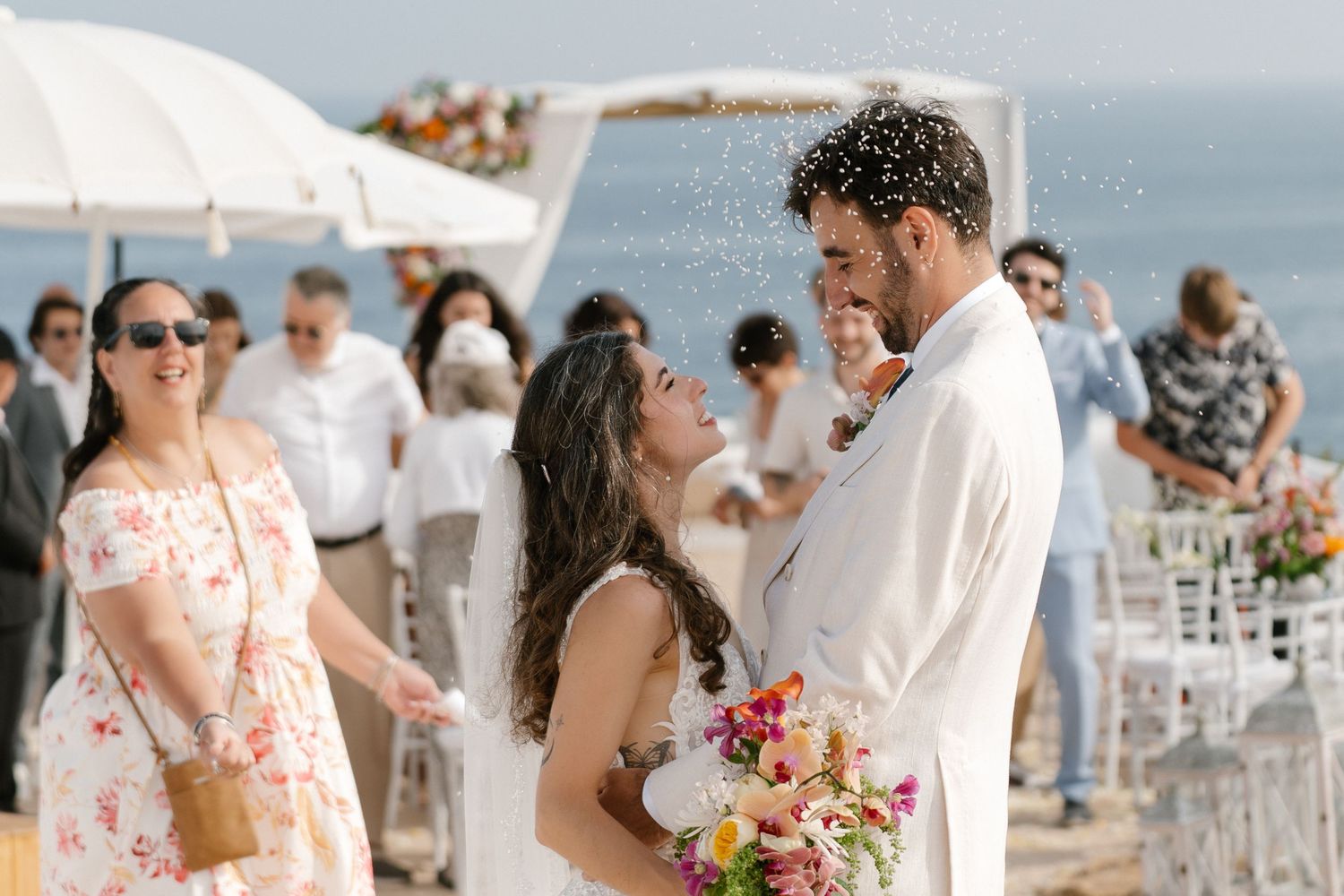 Celebration of married couple on a cliff in the Algarve, Portugal