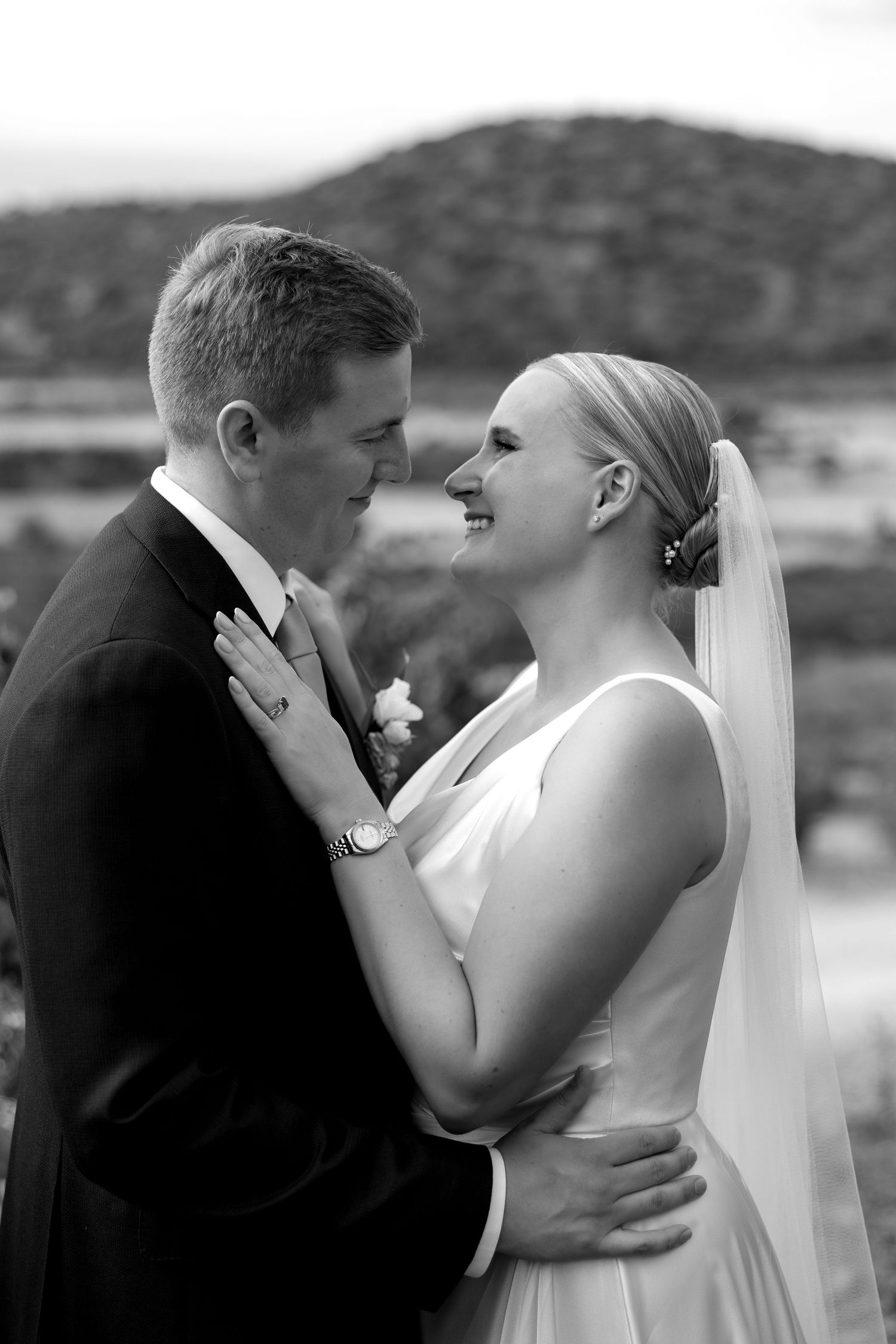 Lovely love story picture of bride and groom by a scenic Portuguese lake