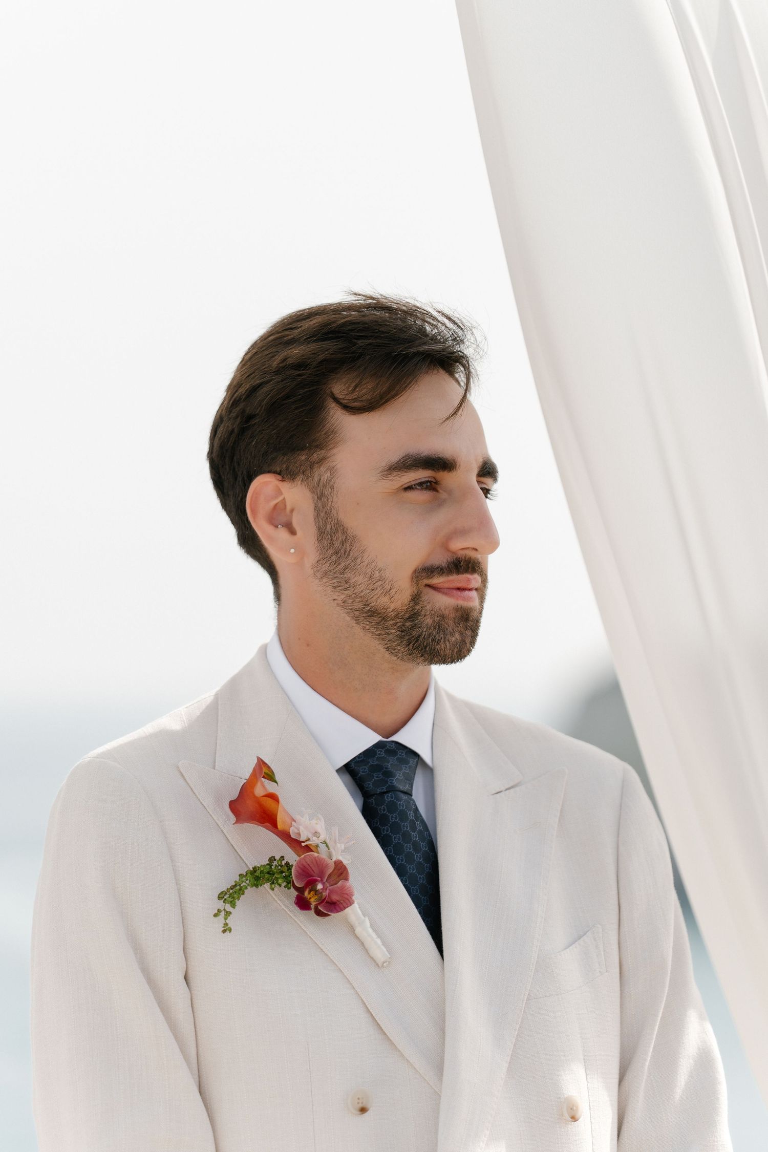 Groom looking at bride