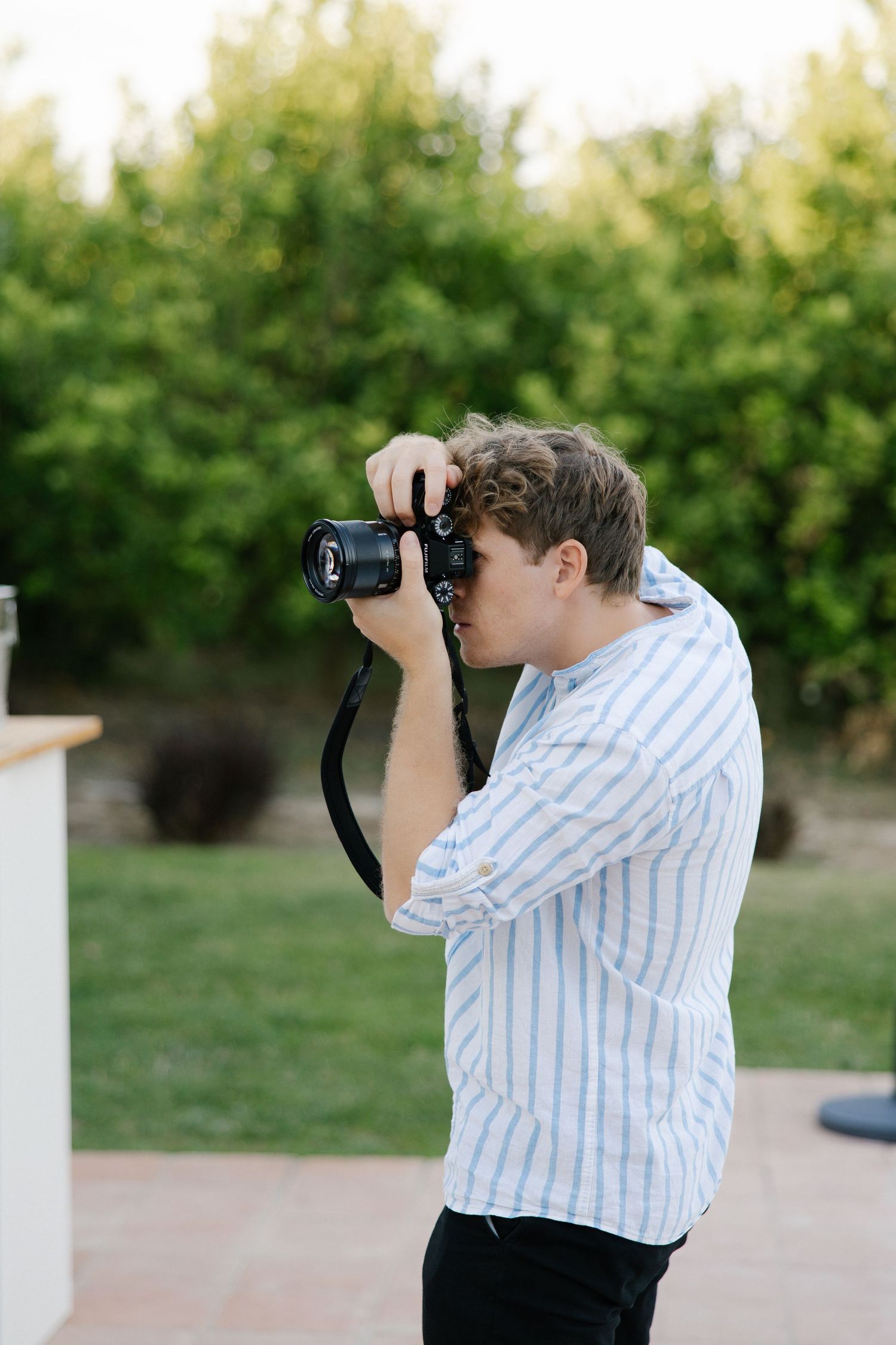 Wedding photographer taking photos and videos during a wedding in the Algarve, Portugal