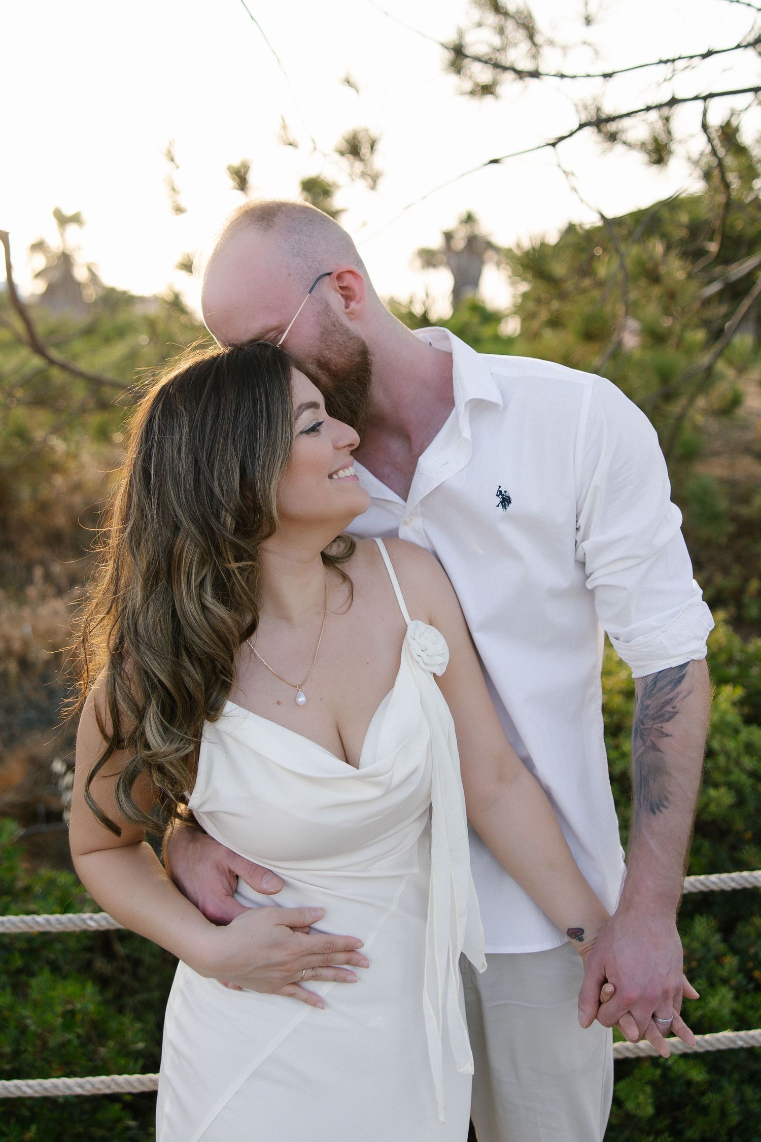 Romantic engagement photoshoot at Praia do Rafael beach in the Algarve, Portugal