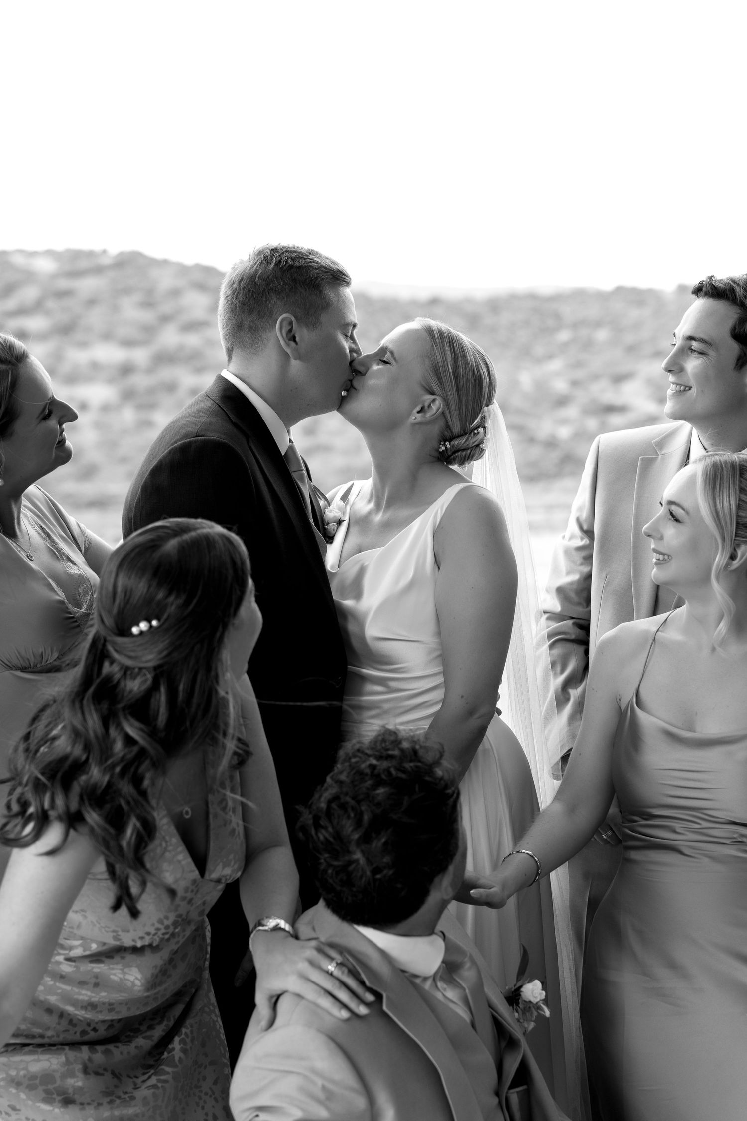 Candid shot of bride and groom smiling together on their wedding day