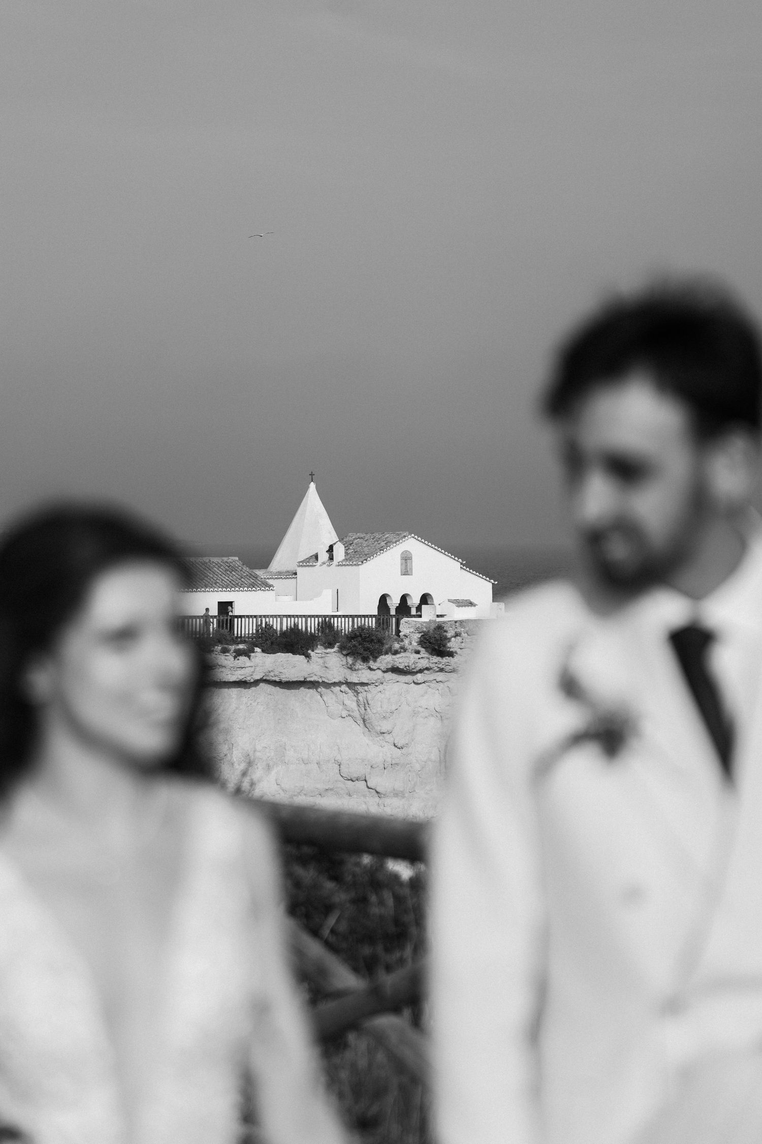 Nossa Senhora da Rocha, couple walking with in the background the chapel