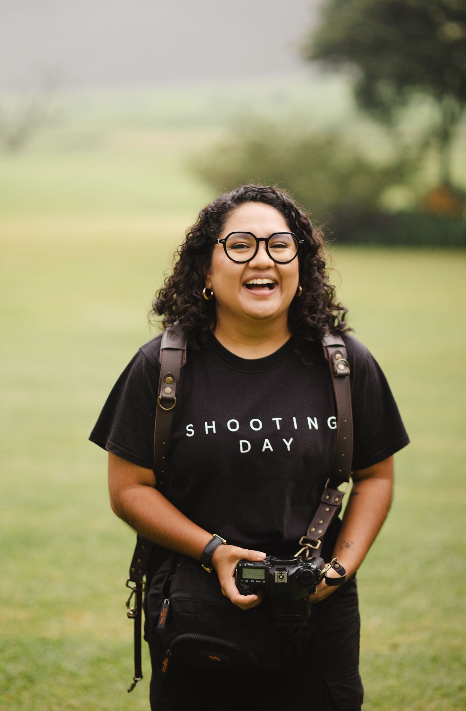 Photographer in black t-shirt with 