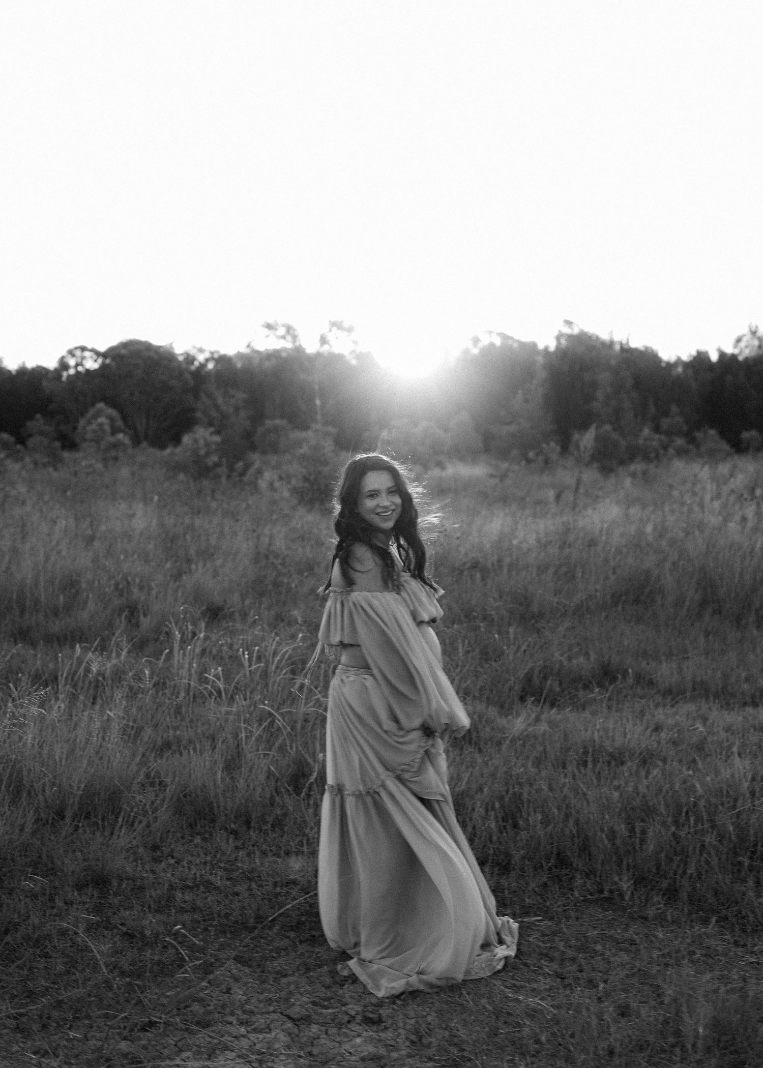 maternity session outdoors at sunset
