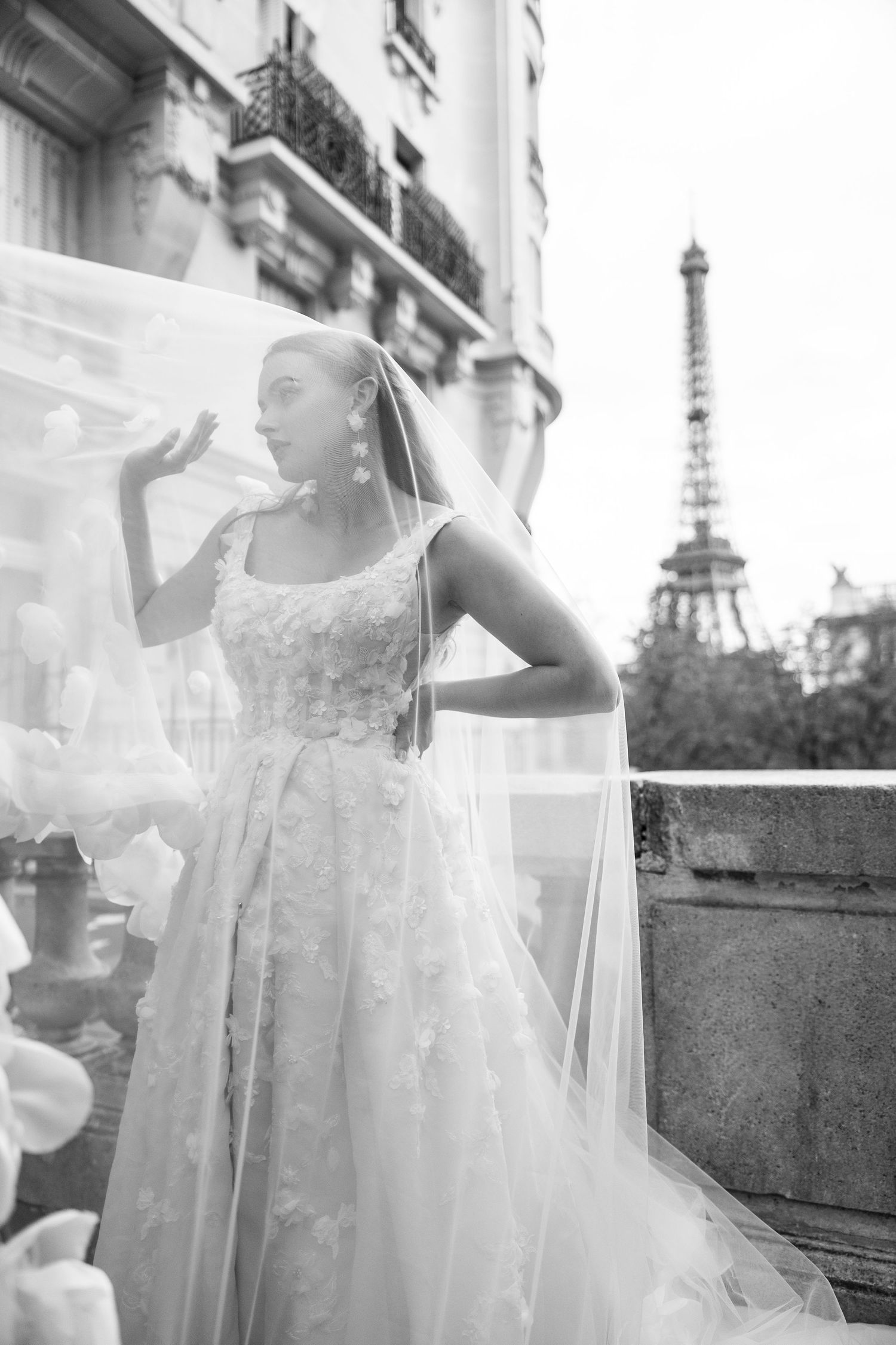 A series of dreamy black and white bridal portraits with the Eiffel Tower visible in the background.
