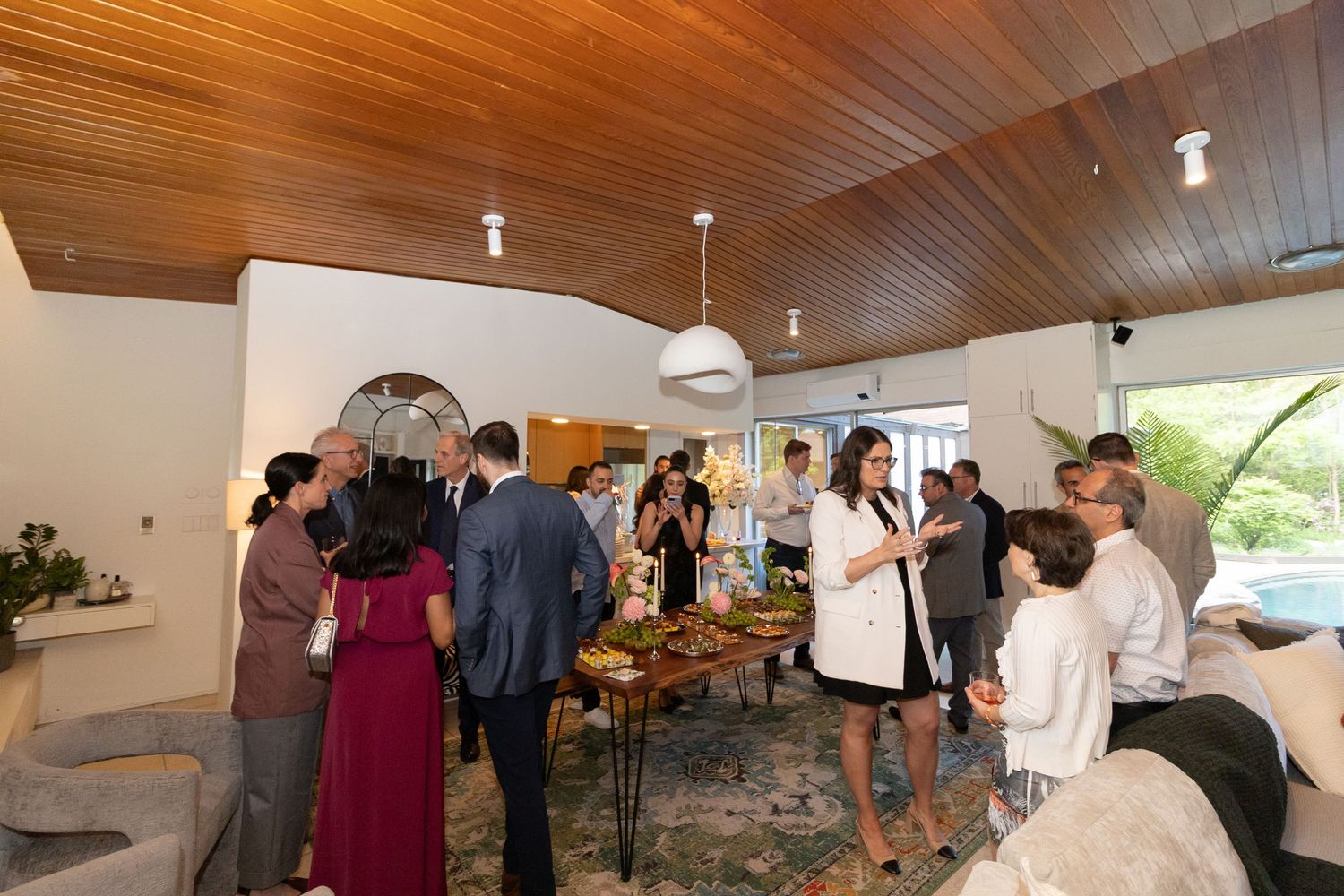 Group photo of family and friends at an engagement party.
