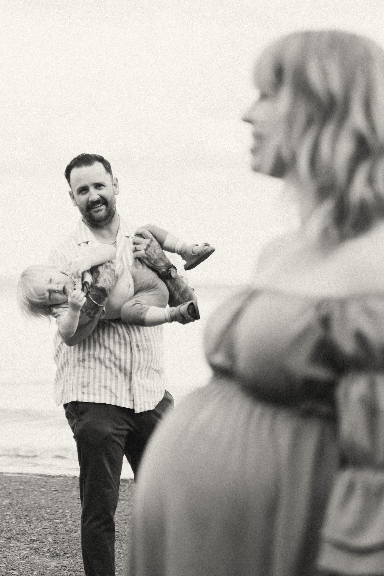 Playful engagement photo sequence on a beach showing candid interactions.