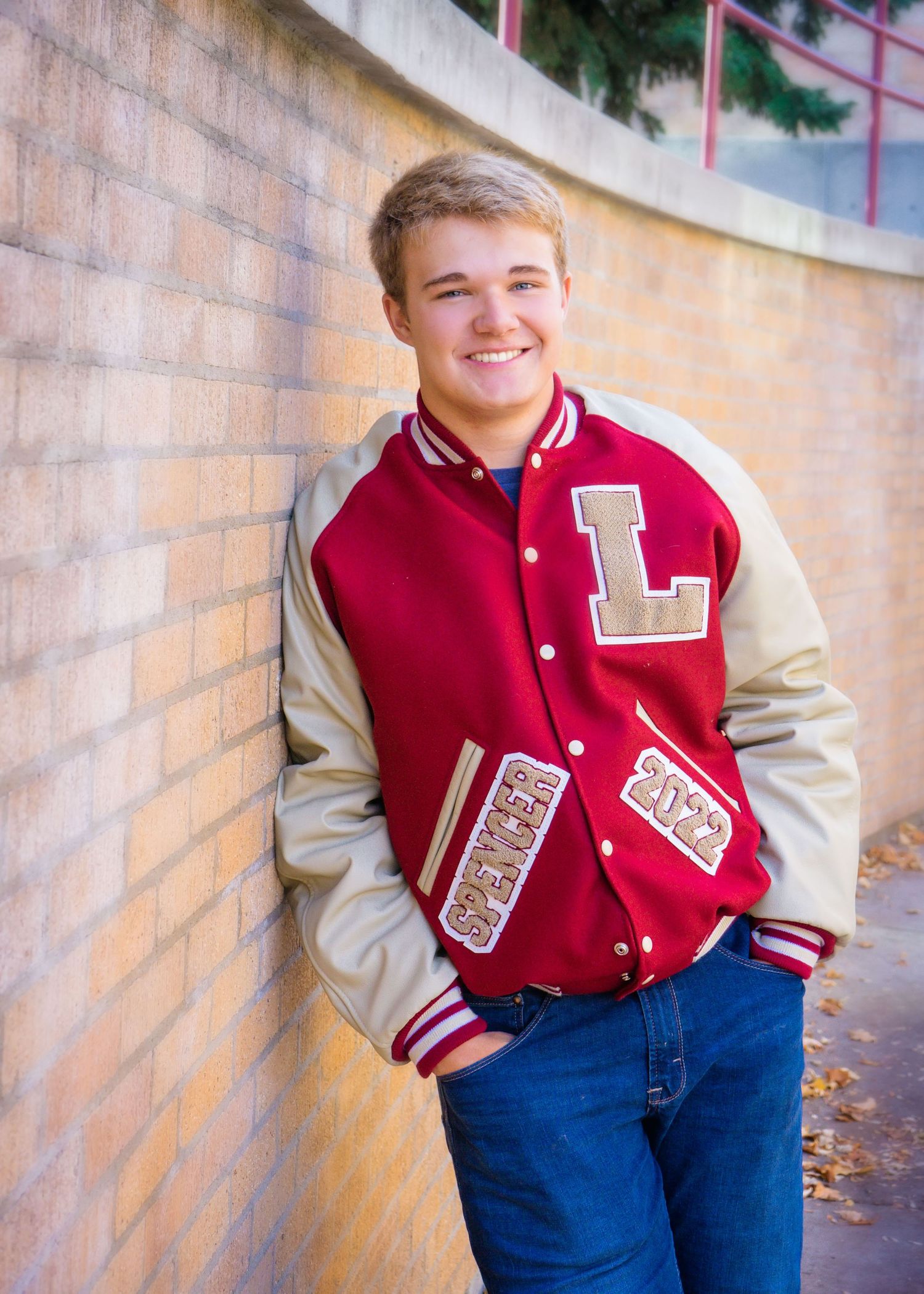 high school senior standing in natural light portrait