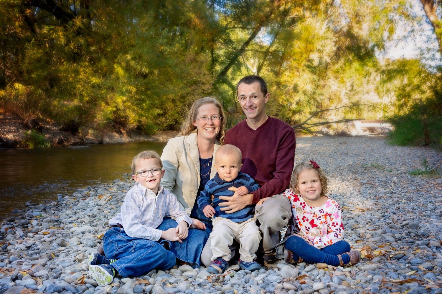 smiling family portrait during outdoor photo session