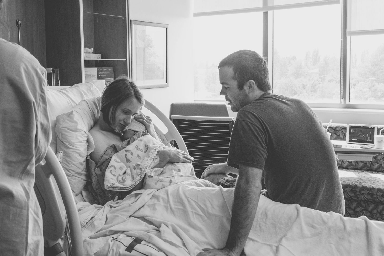 mother in awe of baby, dad in awe of mom