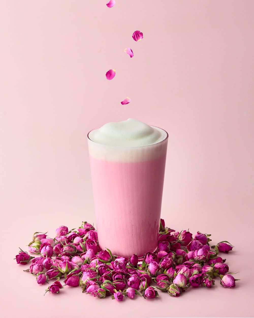Pink rose latte falling dried petals - Barbie food photography - pink food drink photography - Nancy Anne Photography