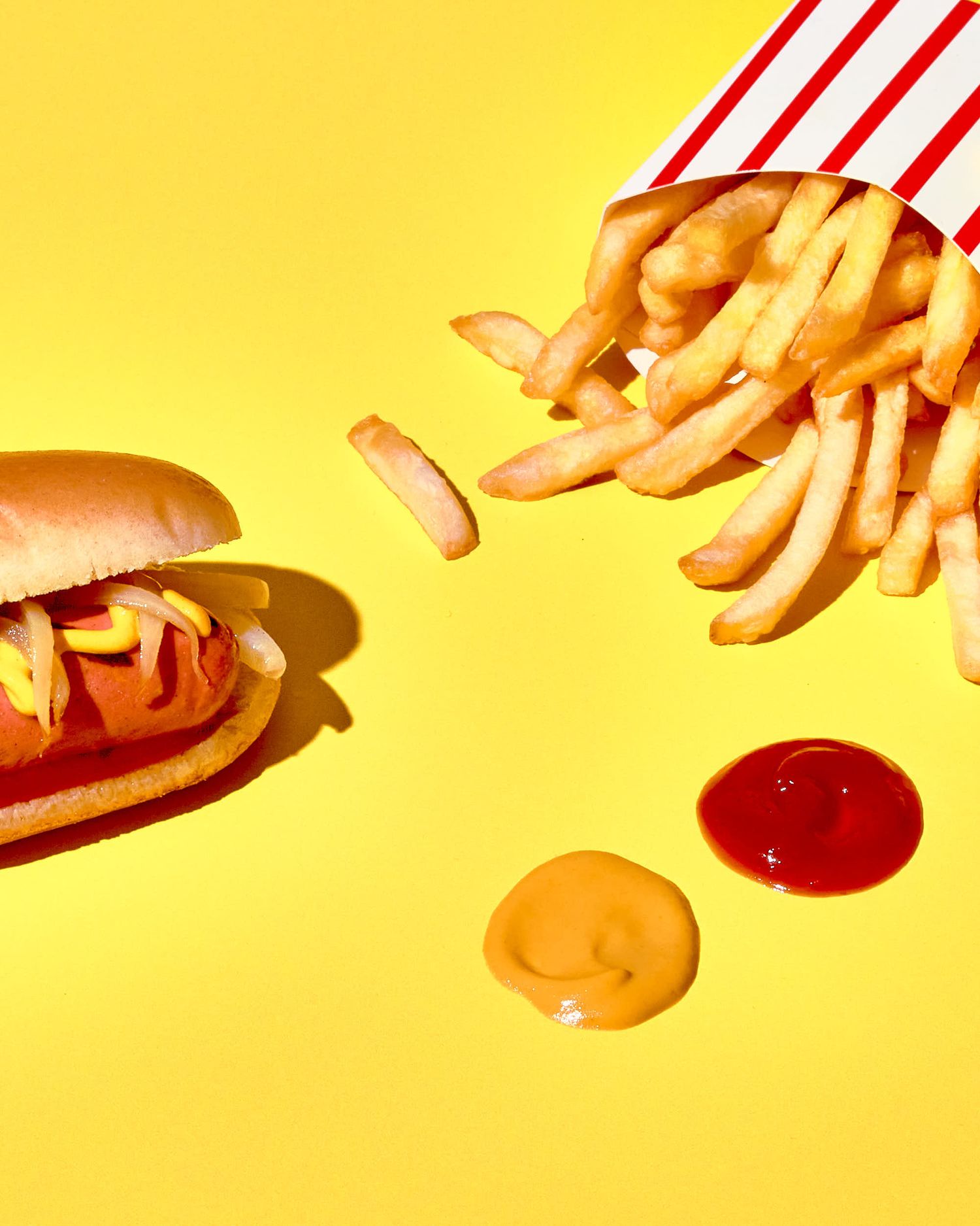 Hot dog, fries, ketchup, mustard - hot dog photography - food and drink photography - Nancy Anne - creative commercial food photographer