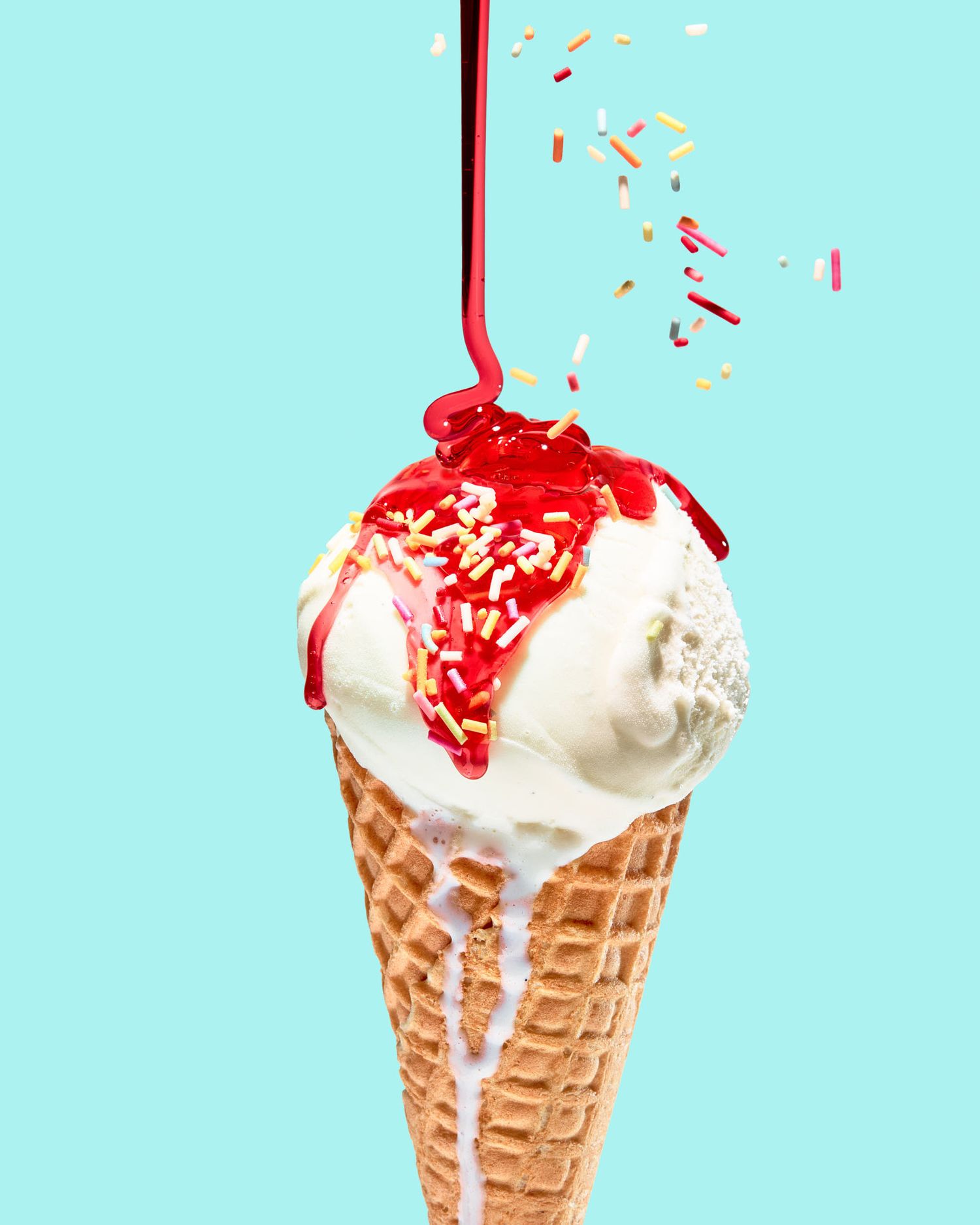 Ice cream photography with strawberry sauce and sprinkles - Nancy Anne Photography