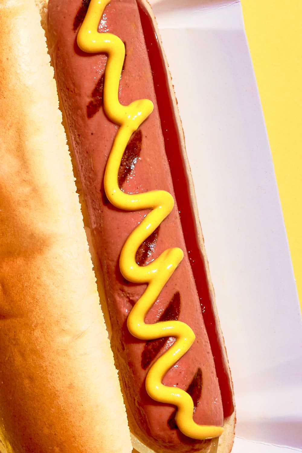 Vegan plant based hot dog photography - hot dog and fries
