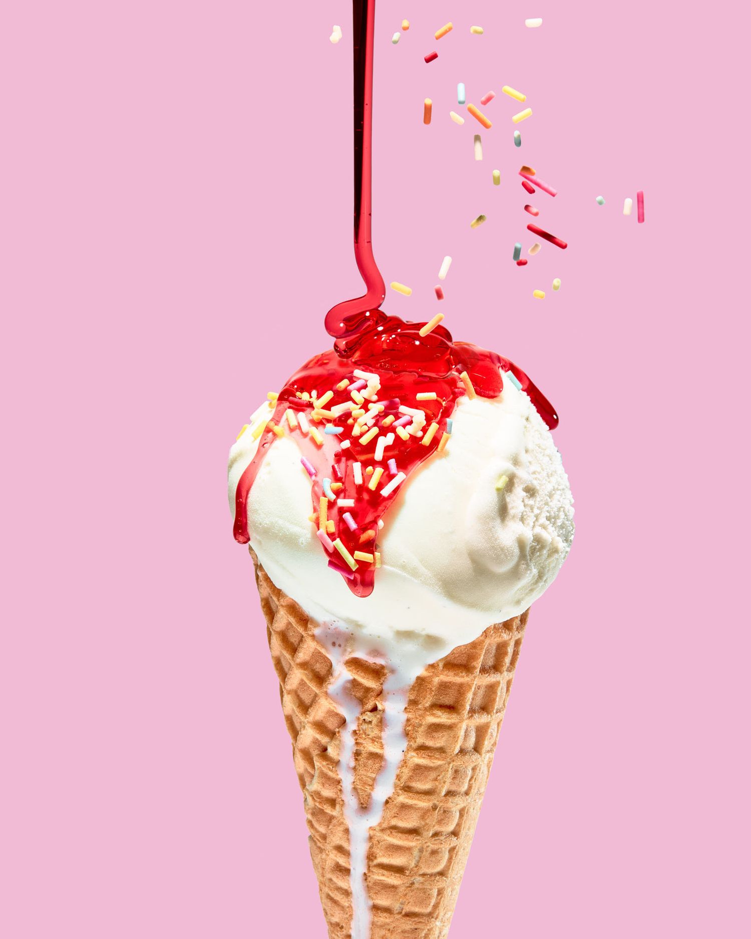 Ice cream photography with strawberry sauce and sprinkles - Nancy Anne Photography
