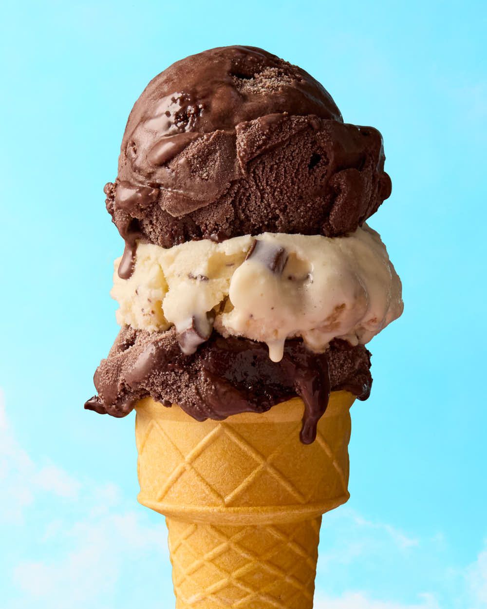 Chocolate and vanilla ice cream cone with melty drips - Ice cream photography - Nancy Anne Photography
