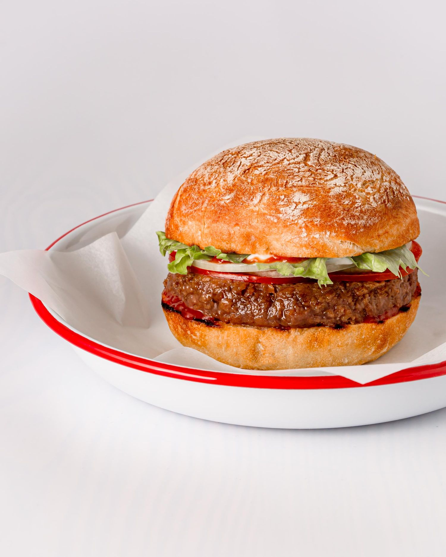 Sunny summer BBQ food photography – grilled vegan burger