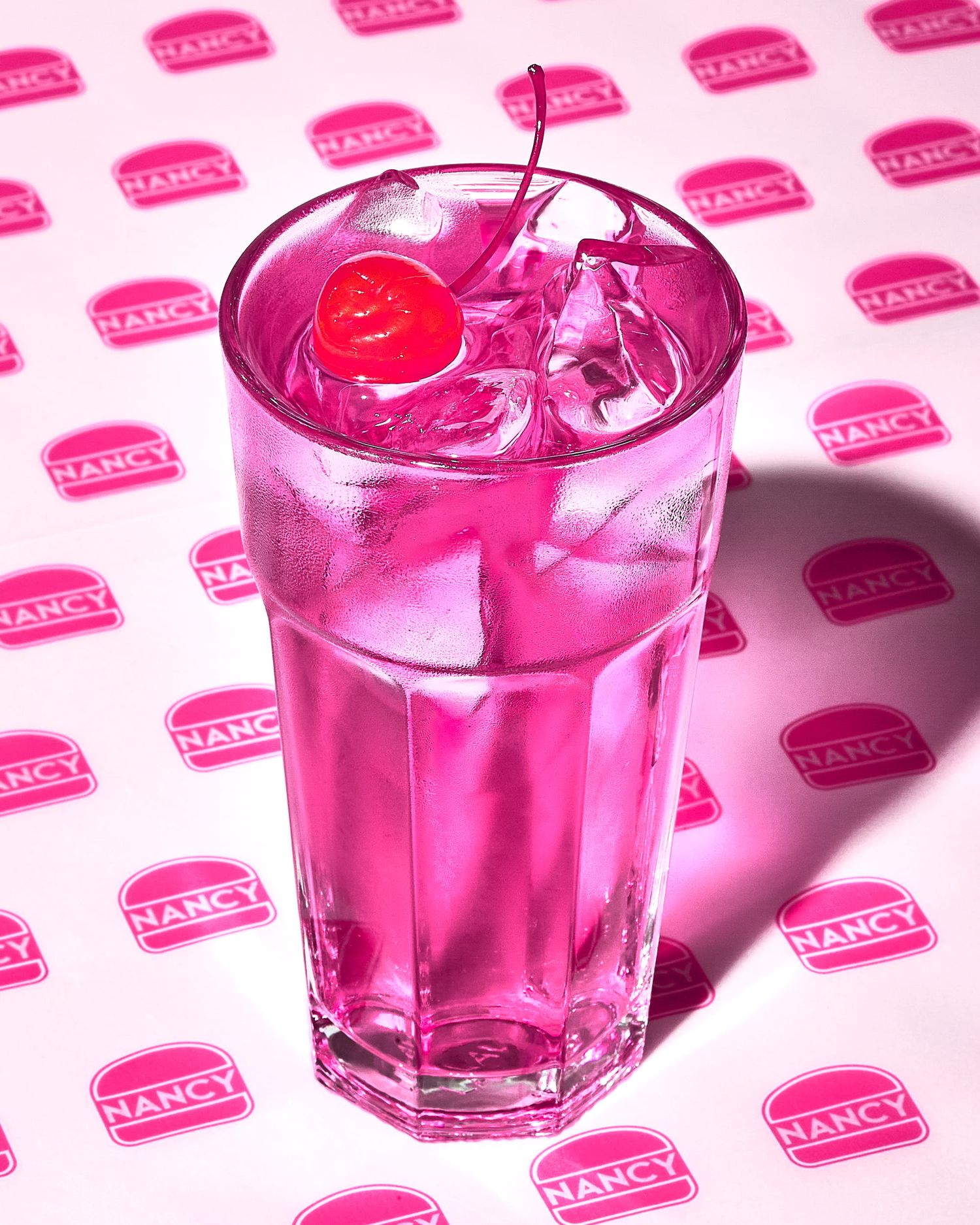 Pink refresher soft drink with maraschino cherry - Wimpy creative pink burger shop photography - food photography project - Nancy Anne