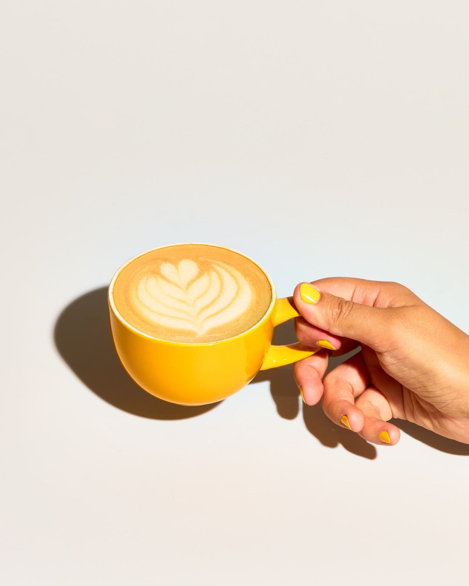Oat milk flat white coffee photography - Oatier oat milk - plant based product drink photography - Nancy Anne - drink photographer London