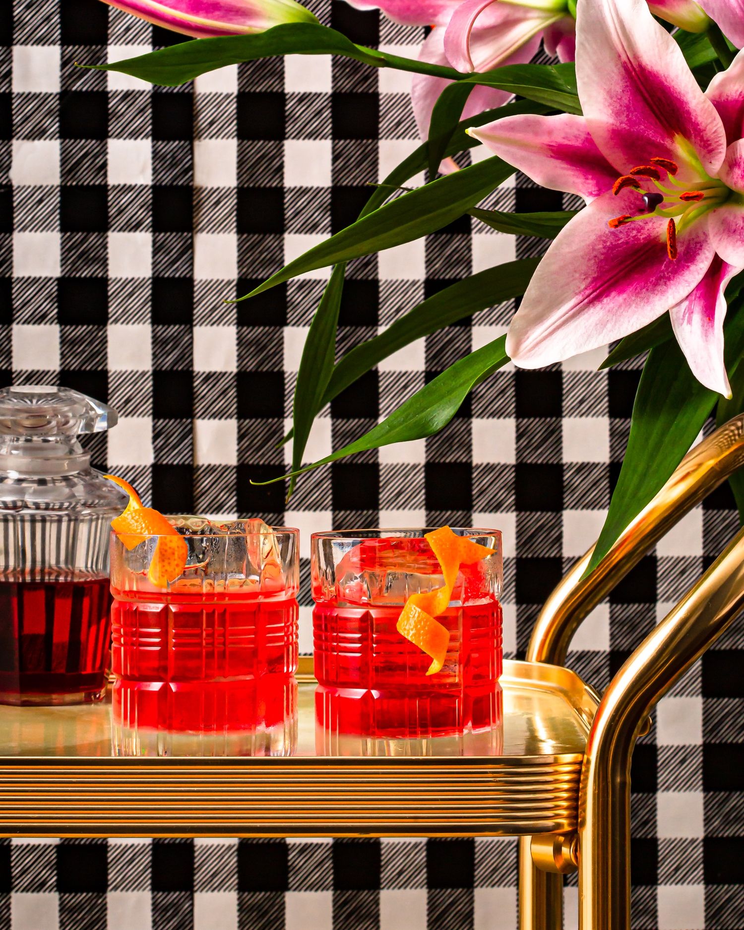 Negroni cocktails on gold cocktail cart - creative cocktail photography - Nancy Anne - drink photographer London