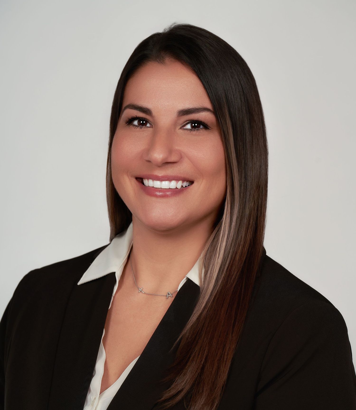 Corporate headshot series showing confident poses in professional attire.