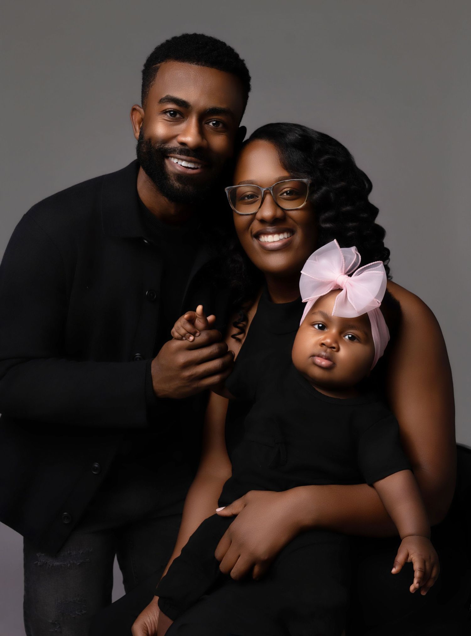 A series of five heartwarming family portrait photos showing joyful expressions and embraces against a neutral background.