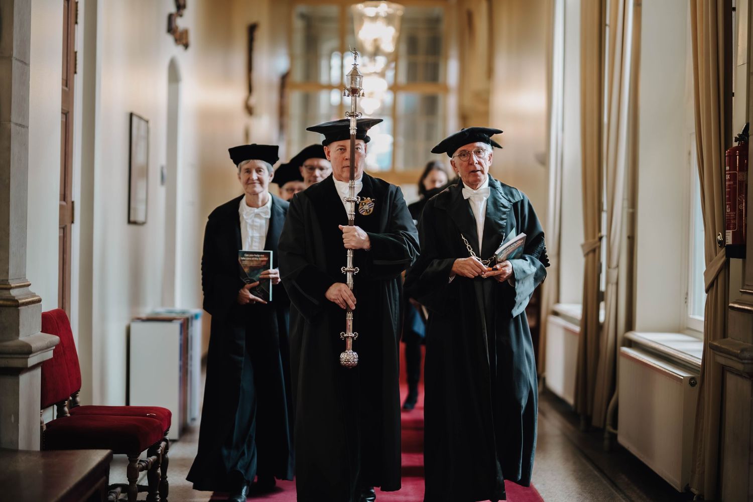 Professors walking towards the PhD defence
