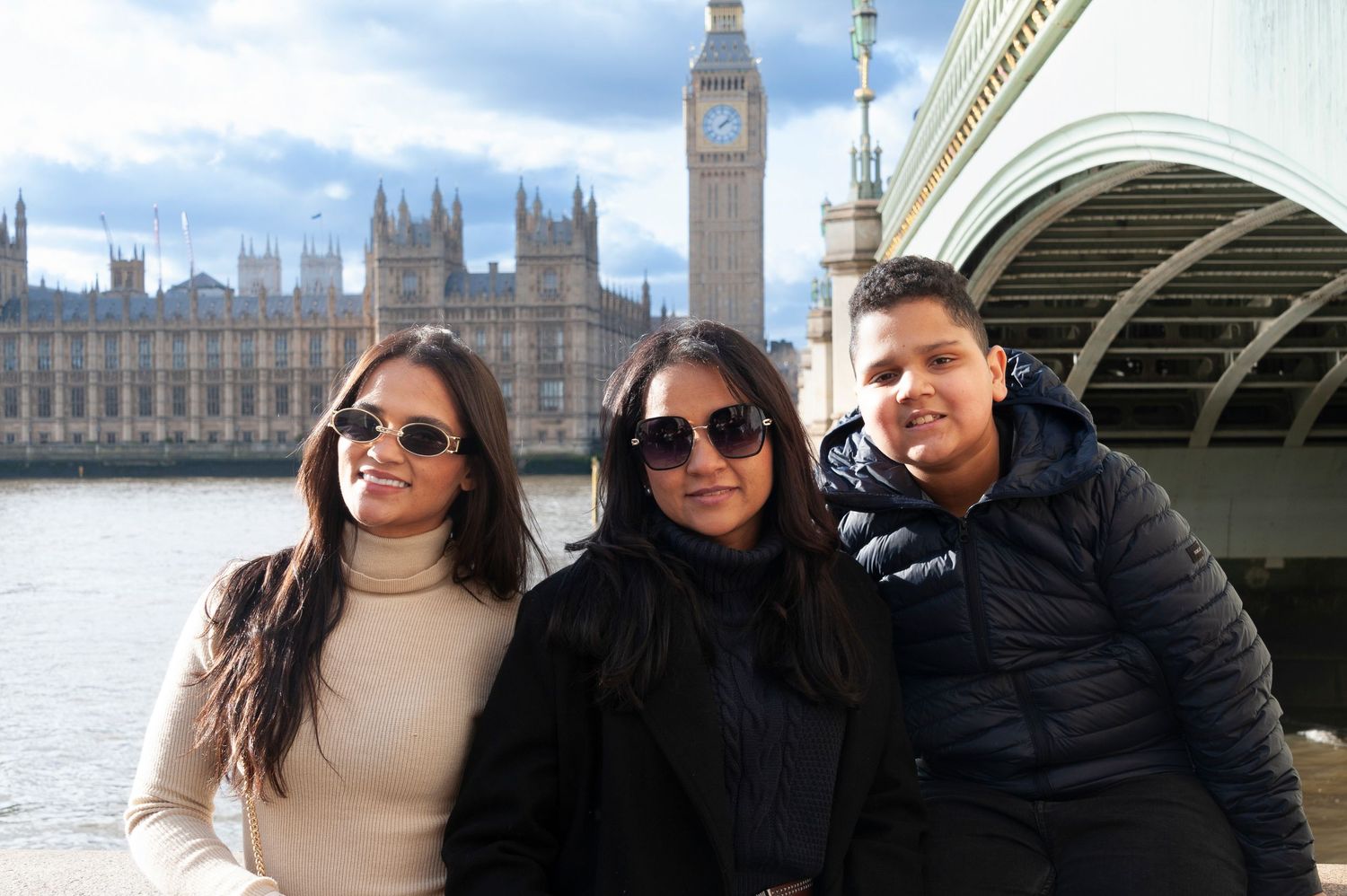 London Tourist family photographed for London Photo Tour with Westminster Bridge with Big Ben in the background.
Photograph by Danny Elwes