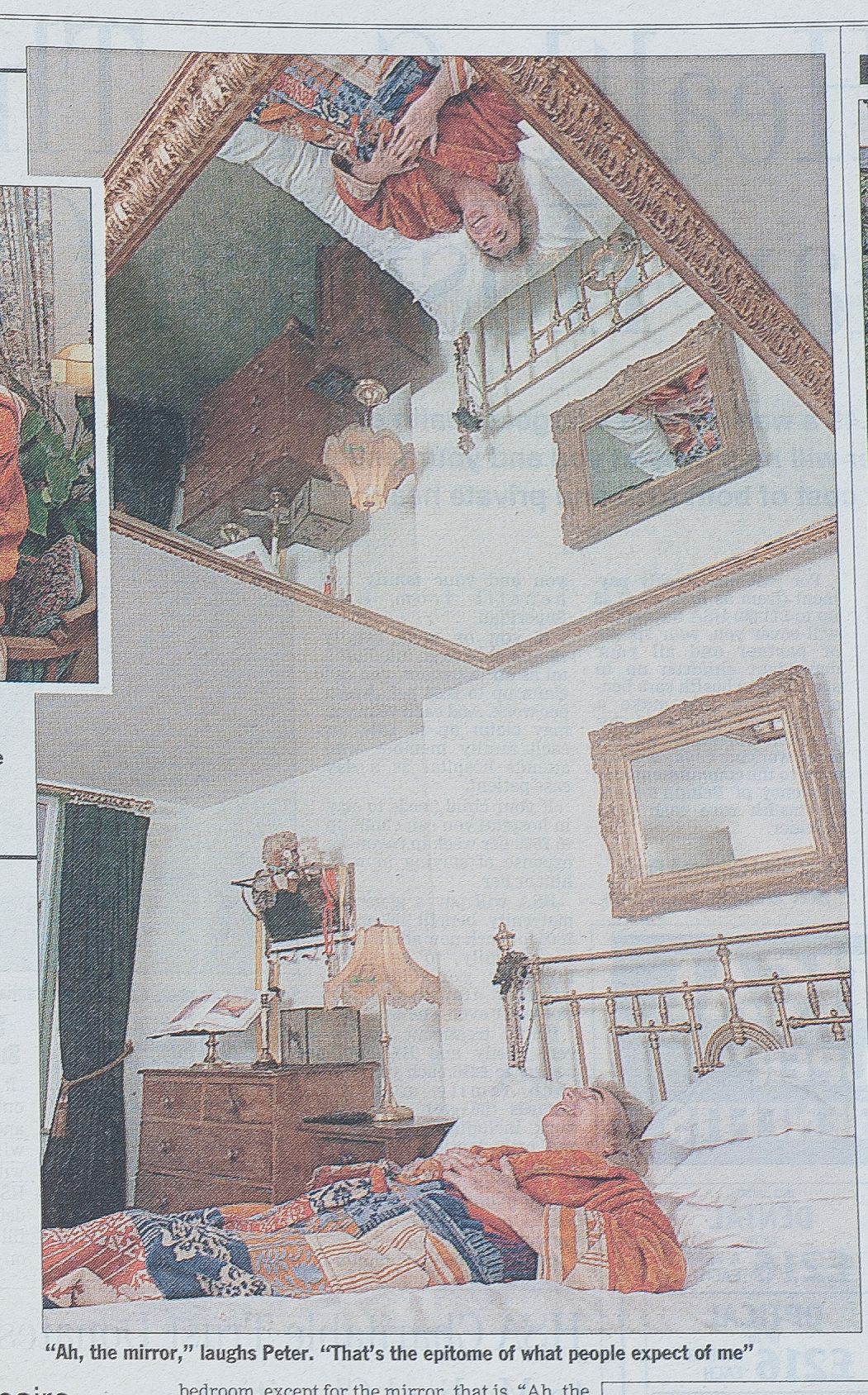 Evening Standard cutting with nightclub owner  Peter Stringfellow on his bed with ornate mirror above him photographs by Danny Elwes.