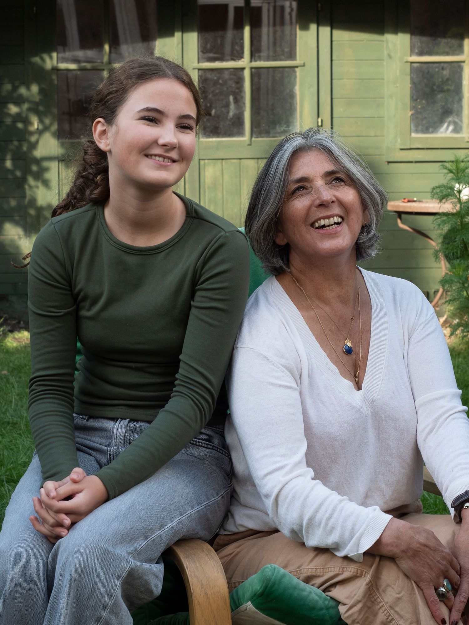 Mum and daughter sitting in their garden for family portrait for 'Before they Fly the Nest'
Photograph by Danny Elwes