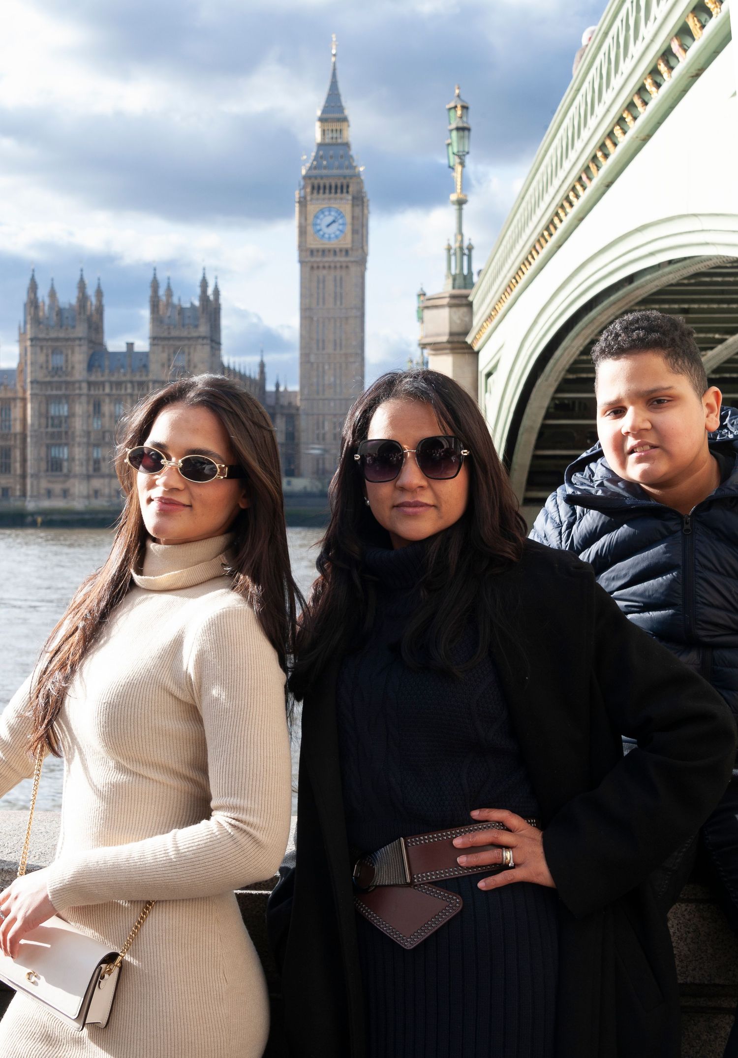 London Tourist family photographed for London Photo Tour with Westminster Bridge with Big Ben in the background.
Photograph by Danny Elwes