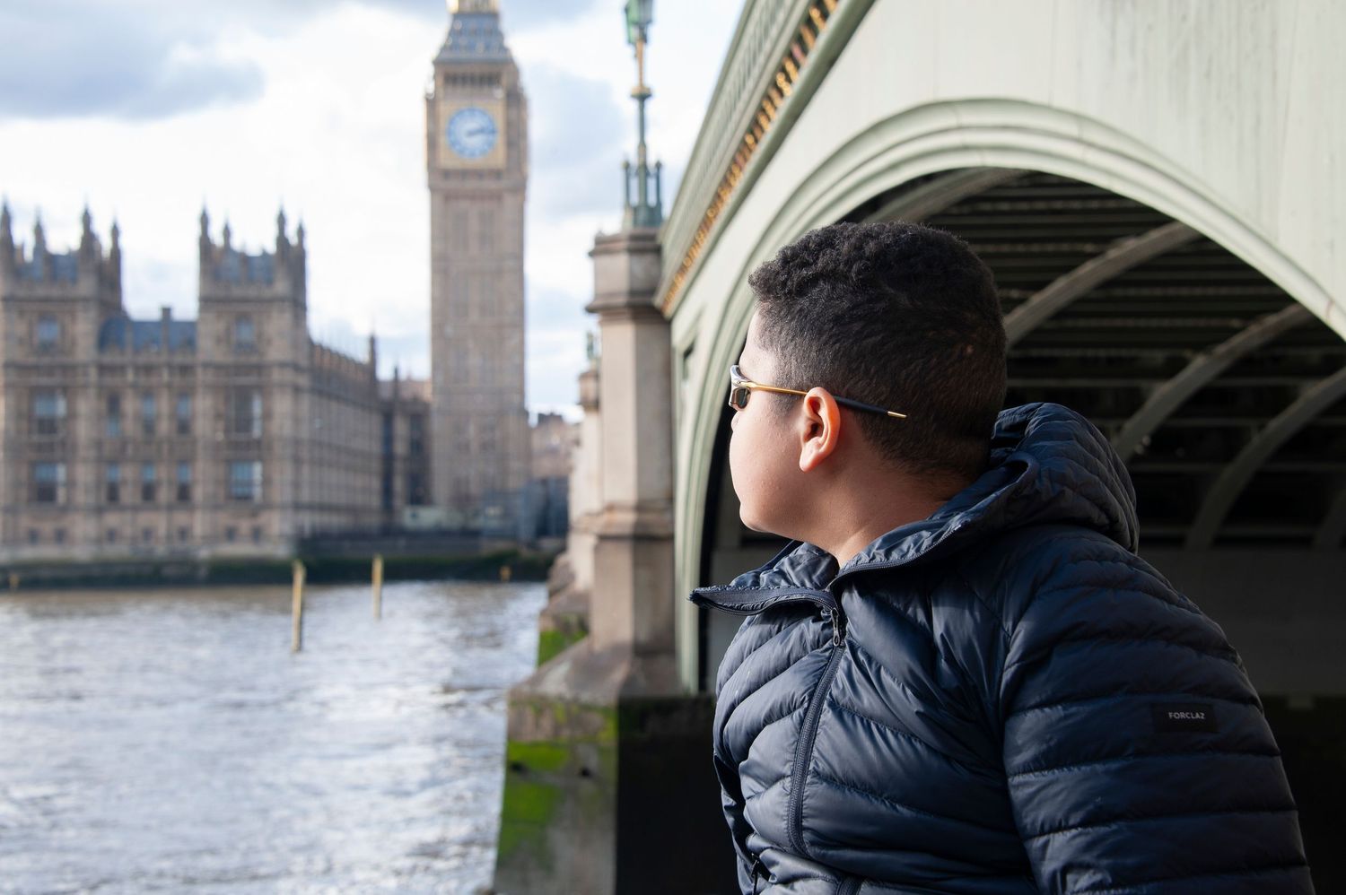 London Tourist photographed for London Photo Tour with Westminster Bridge with Big Ben in the background.
Photograph by Danny Elwes