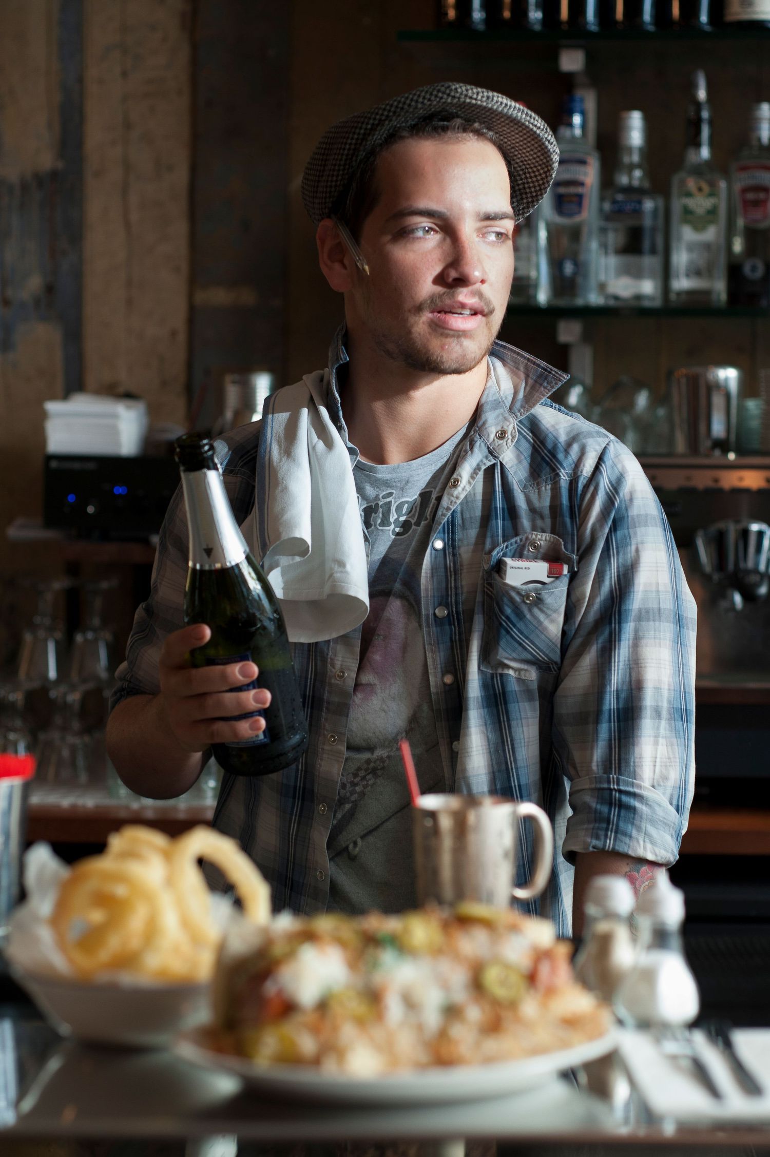 Alex, barman in the Jewish deli inspired restaurant Miskins in Soho part of the Polpo group
Photograph by Danny Elwes