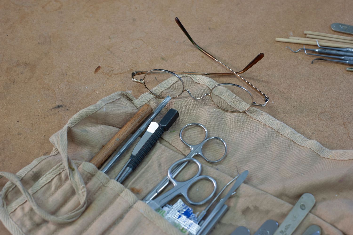 Collection of art supplies & tools laid out. For commercial photographic shoot on art restoration at Houghton Hall
Photograph by Danny Elwes
