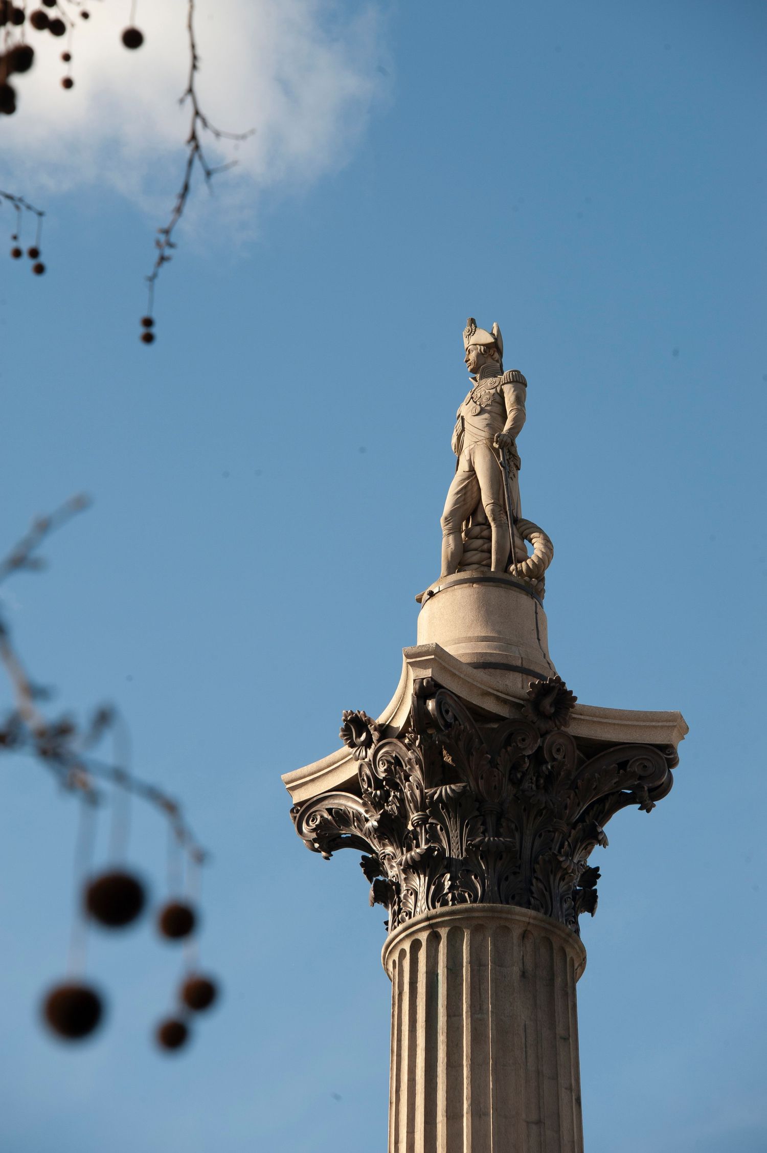 Nelson's column Trafalgar Square London against a blue sky background. For tourist on vacation, London Photo Tour.
Photograph by Danny Elwes