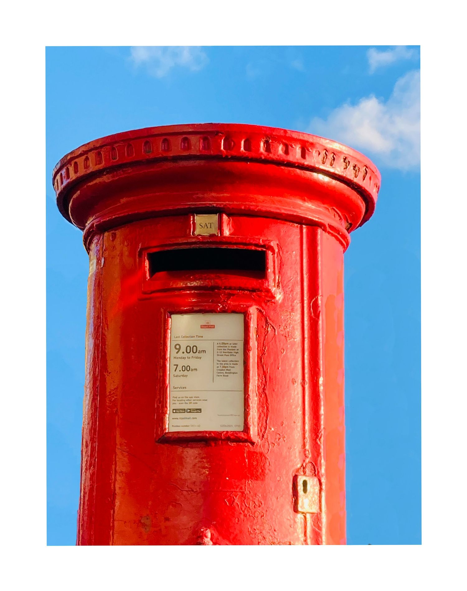 Close-up view of red Royal Mail post box with collection time notice.
Photograph by Danny Elwes