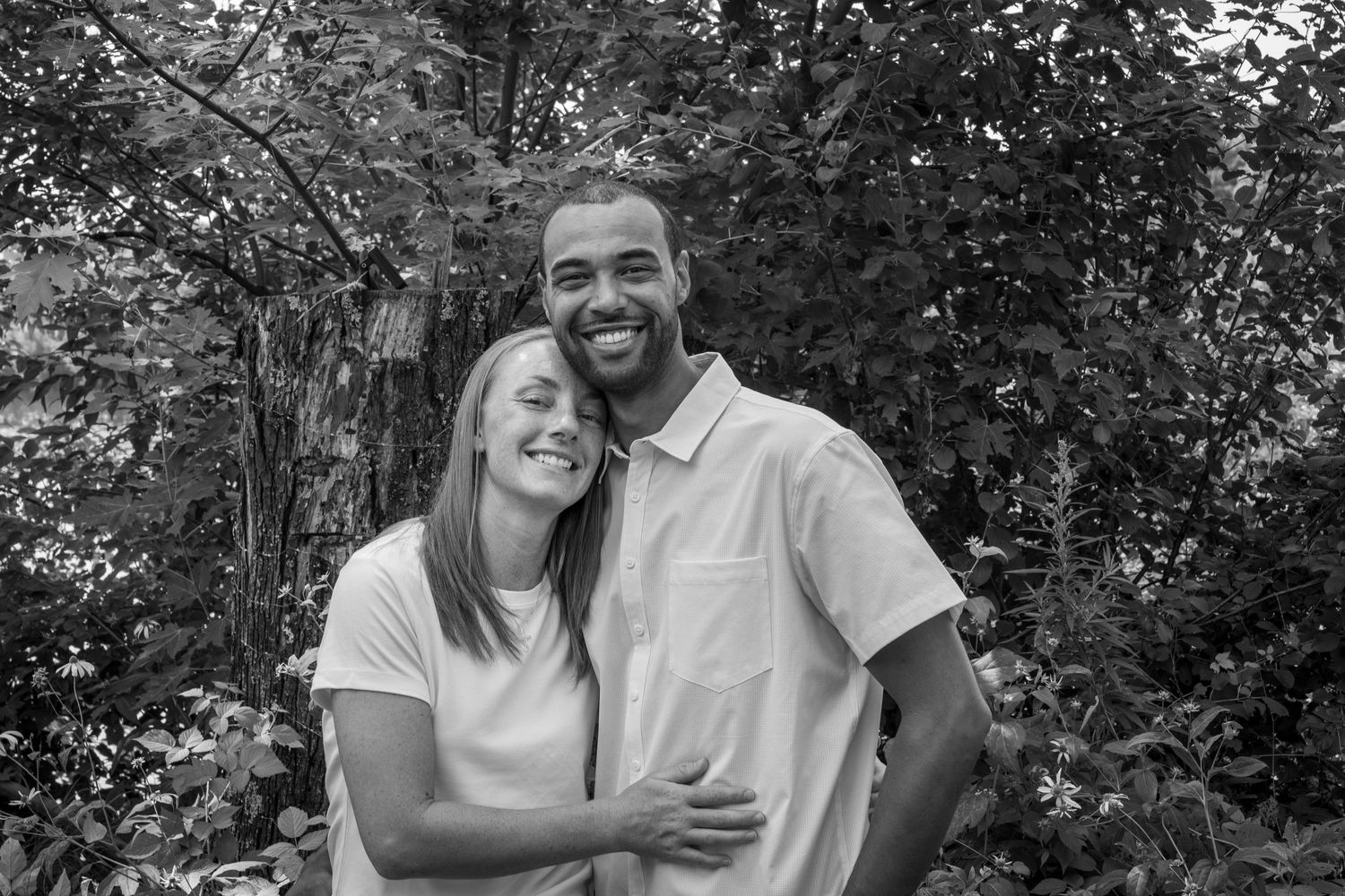 A series of candid outdoor photos showing couples laughing and embracing in a natural garden setting.