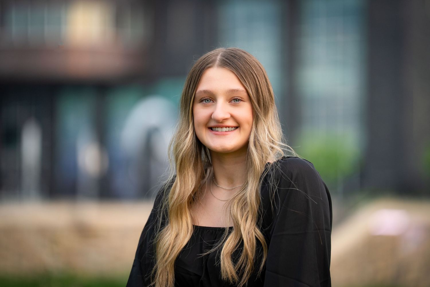 A series of professional headshots showing a person in business attire against blurred backgrounds.