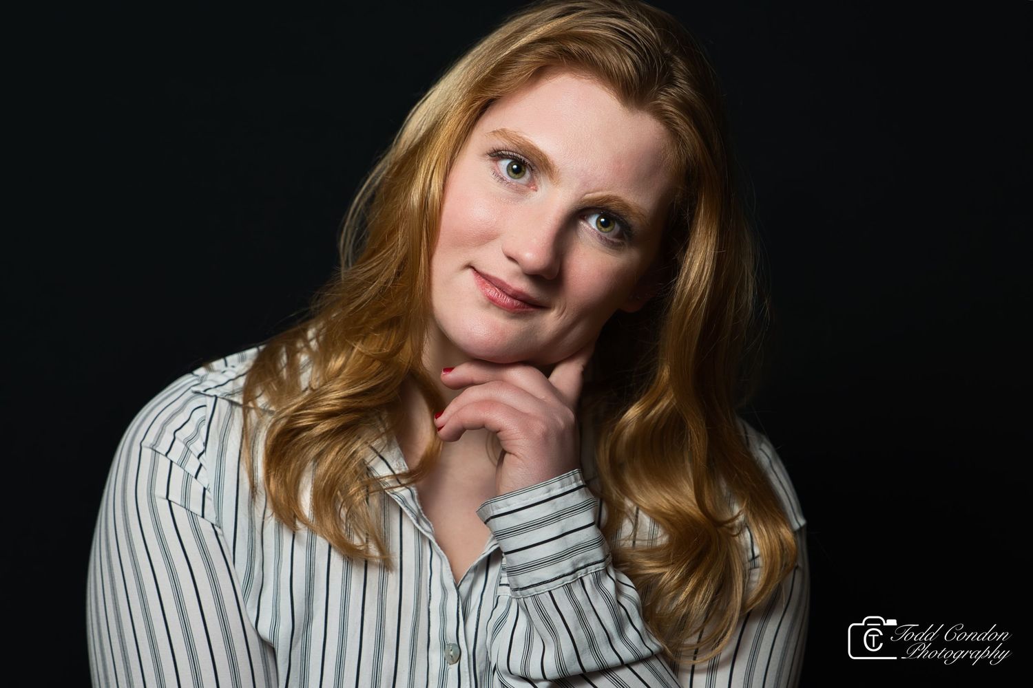 A collection of casual portrait poses in a striped shirt against a dark background.
