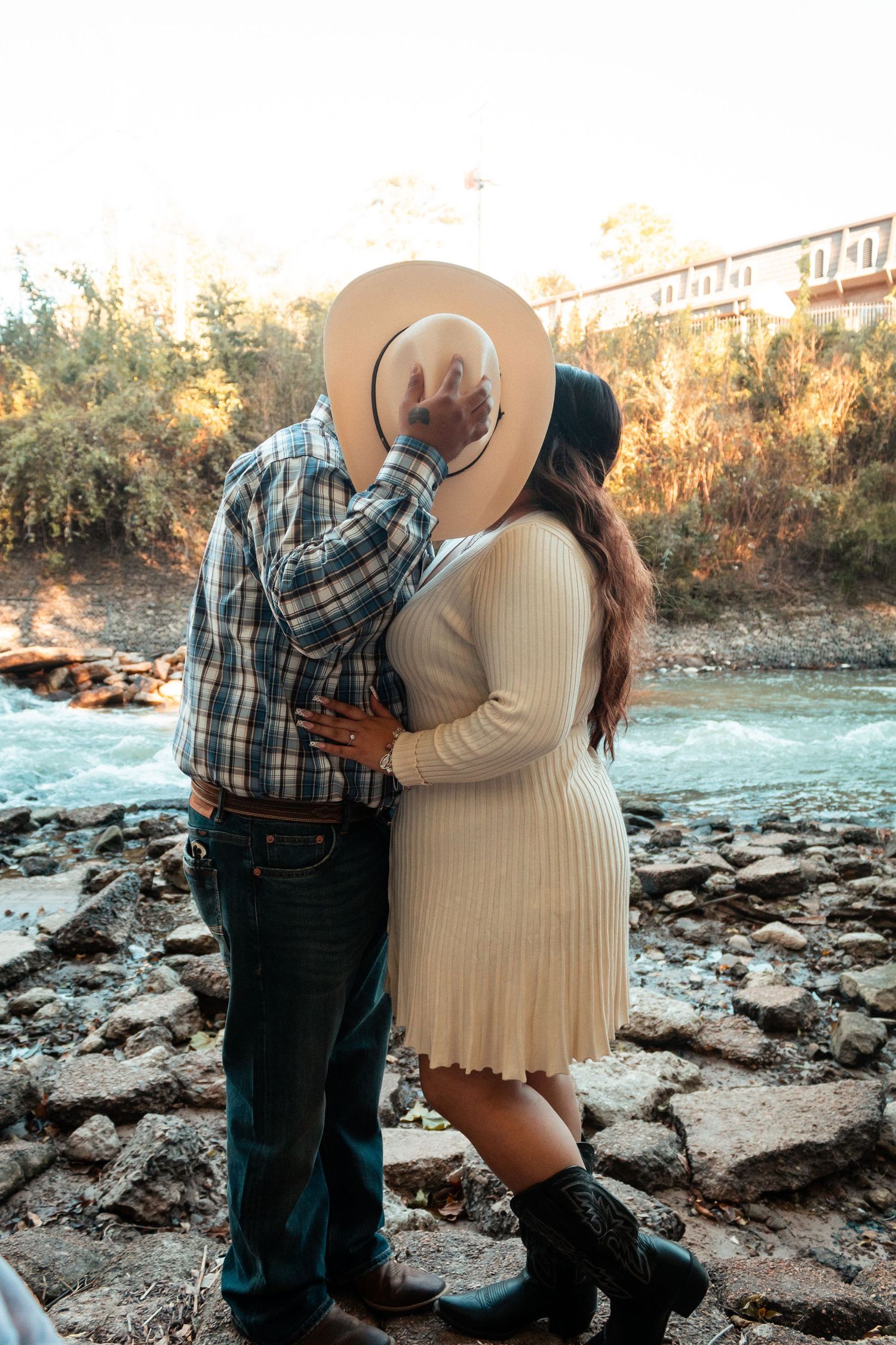 A couple sneaking a kiss